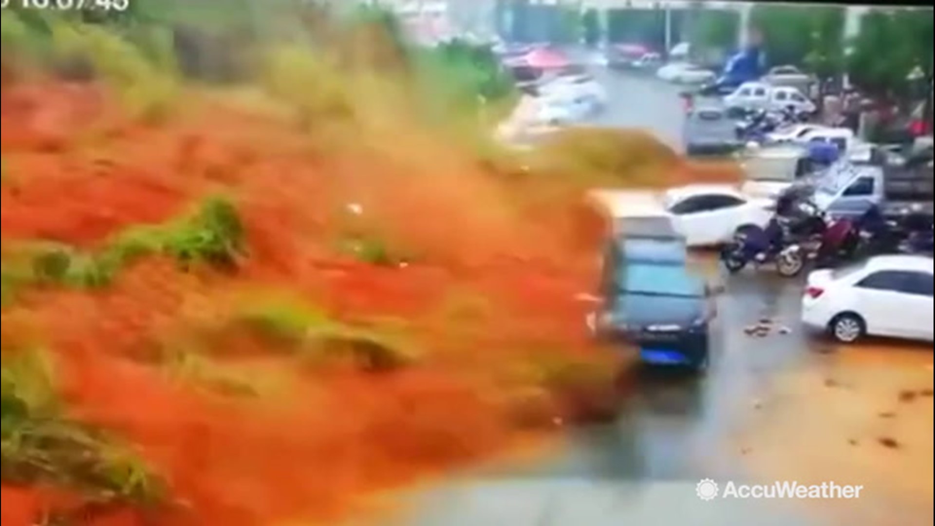 A strong rainstorm triggered this massive landslide in China's Fujian province on June 13.  It was so powerful that it knocked over these parked vehicles like they were nothing.  No deaths were reported in the incident.