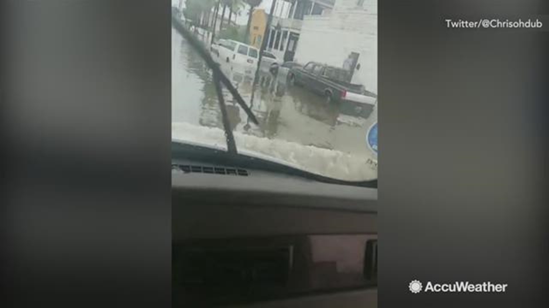 This footage shows the severity of the flooding that left numerous vehicles and roads underwater.