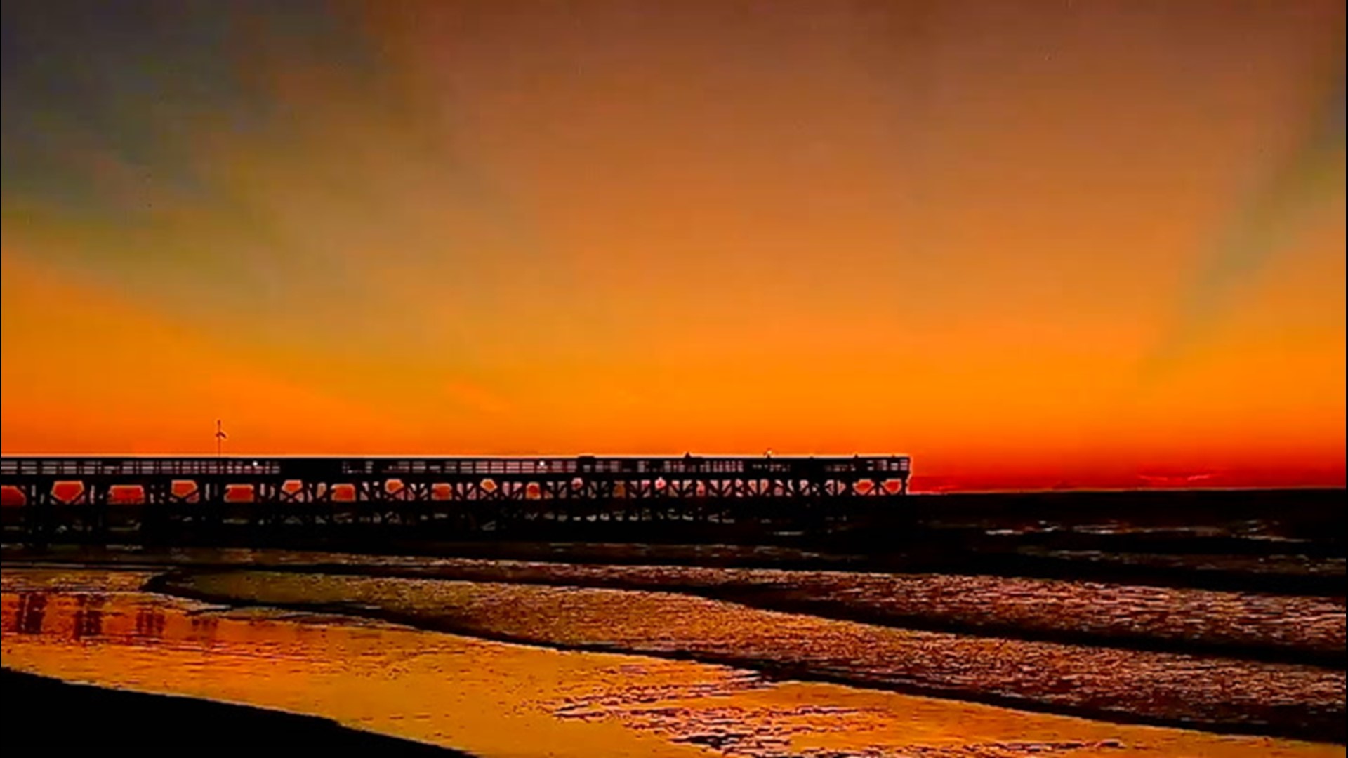 A stunning morning sunrise turns the skies orange in Isle of Palms, South Carolina, on Oct. 30. It's a fitting color for the Halloween weekend.