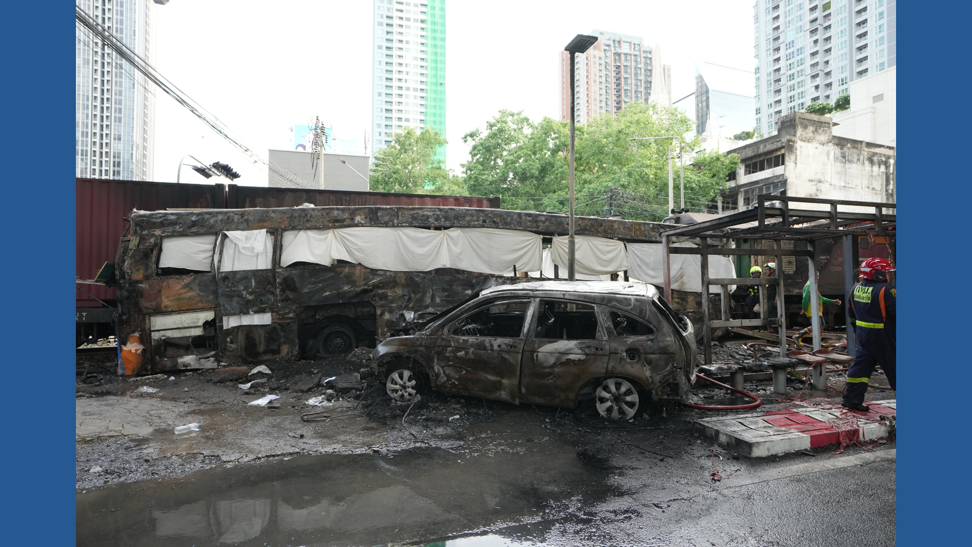 A cargo train hits a public bus at a Bangkok rail crossing | ksdk.com