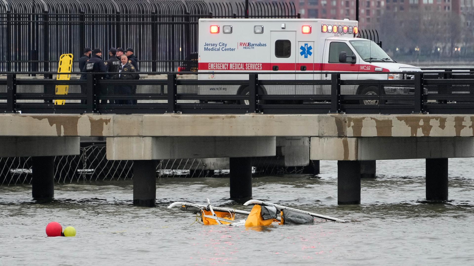 A sightseeing helicopter broke apart in midair Thursday and crashed upside-down into the Hudson River between Manhattan and the New Jersey waterfront, killing six.