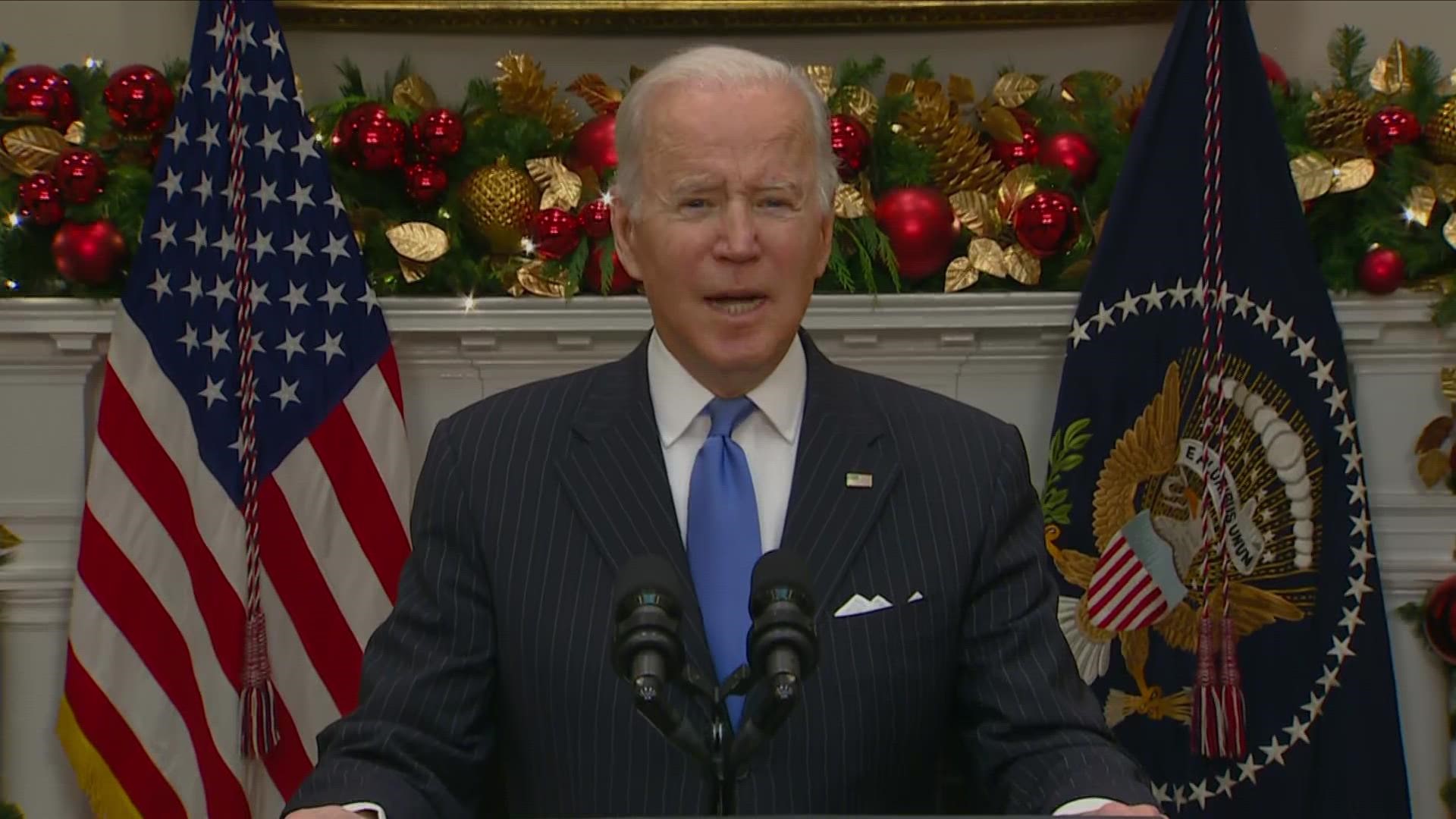 President Joe Biden urged Americans to get vaccinated, including booster shots, to combat concerns over the COVID-19 variant named omicron.