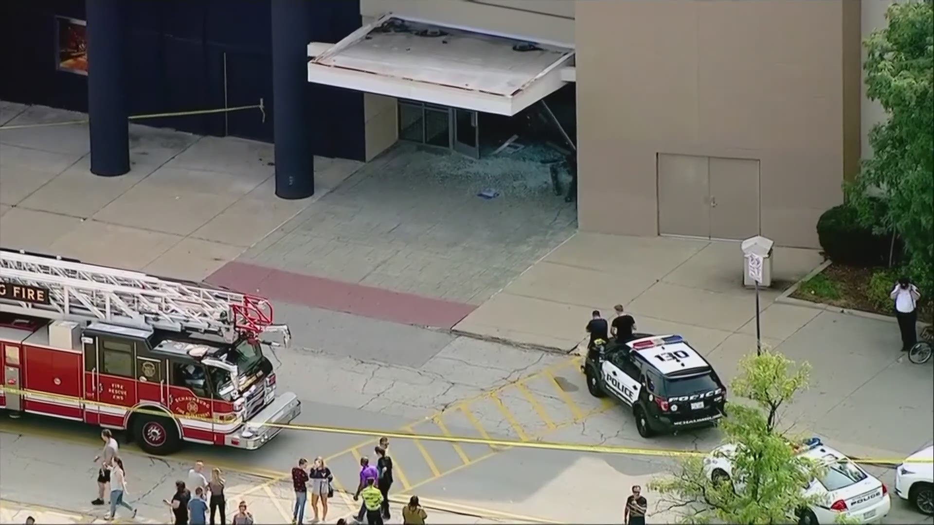 Police have arrested a man who drove through the corridors of a suburban Chicago mall before crashing into a clothing store.