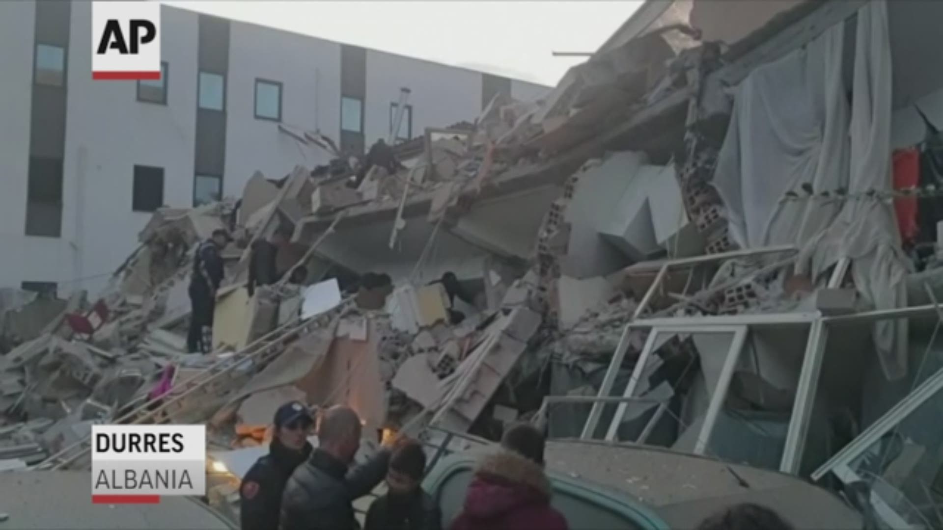 A strong earthquake shook Albania early Tuesday, killing some people who were trapped in collapsed buildings and injuring hundreds.