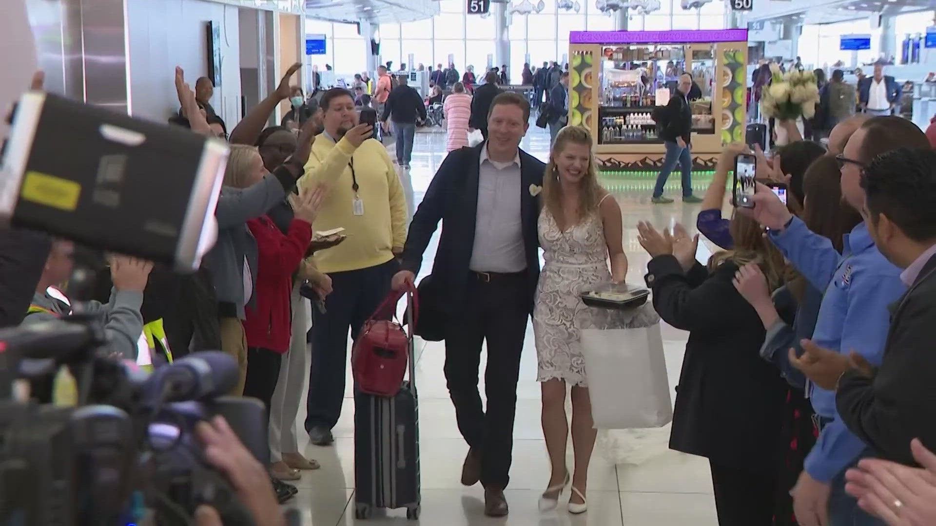 A busy Southwest terminal was the backdrop for Lara Mark and U.S. Navy Lt. Commander Cylas Hensley's special day.