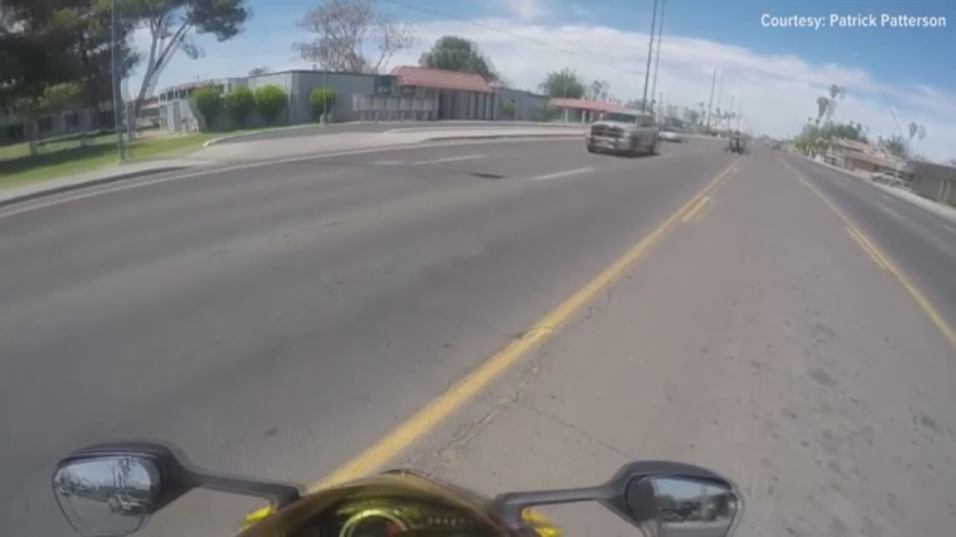 Three motorcyclists in Mesa turned around to lend a hand to an elderly woman trying to cross a busy intersection. Video: Patrick Patterson