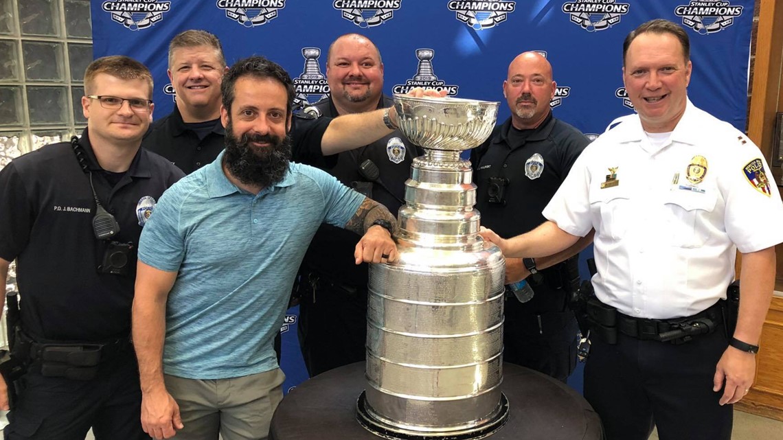 My dad drinking out of the Stanley cup with the Blues coach : r/hockey