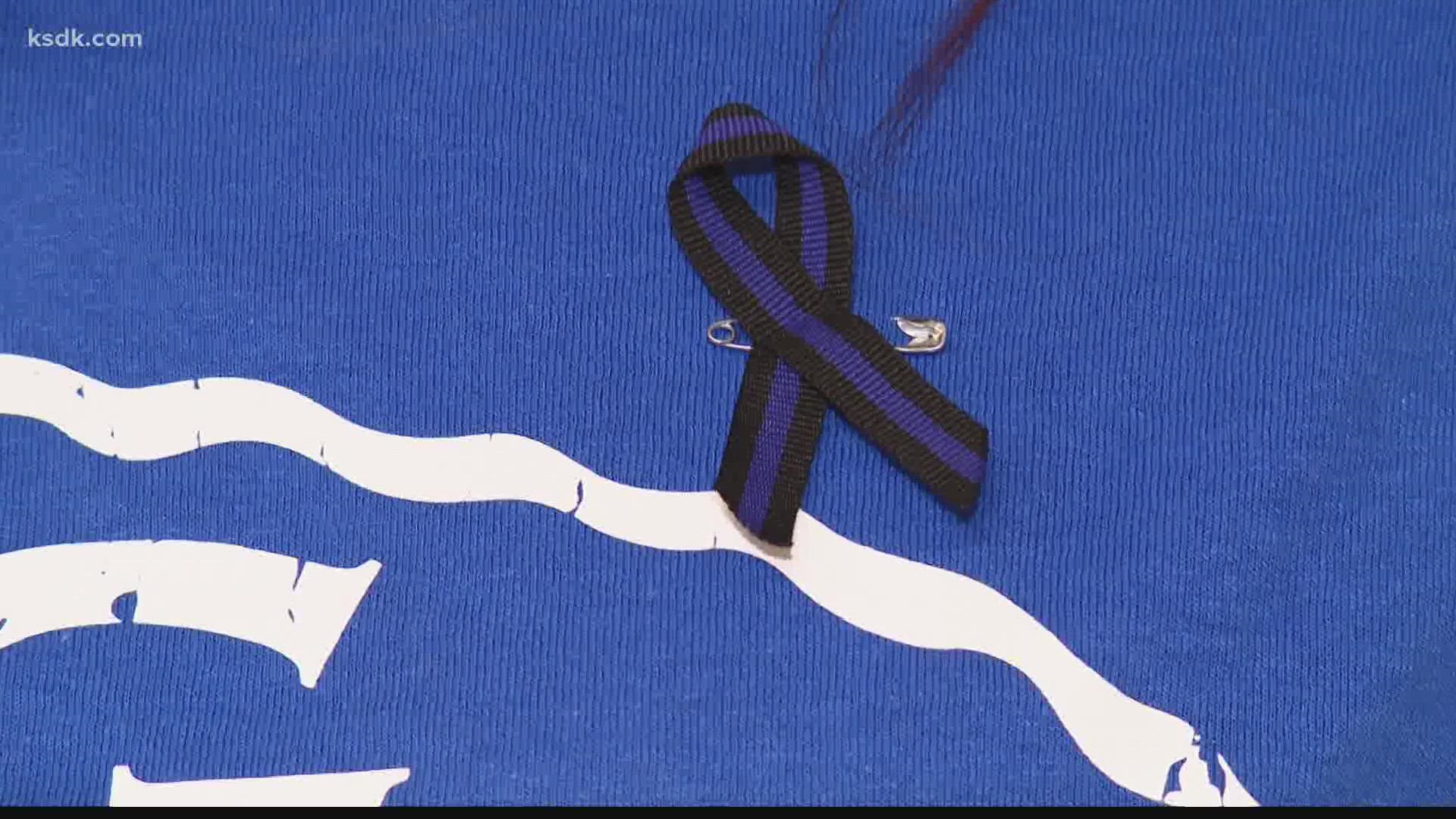 The district encouraged students to wear blue in honor of Timmins and they also raised money for BackStoppers