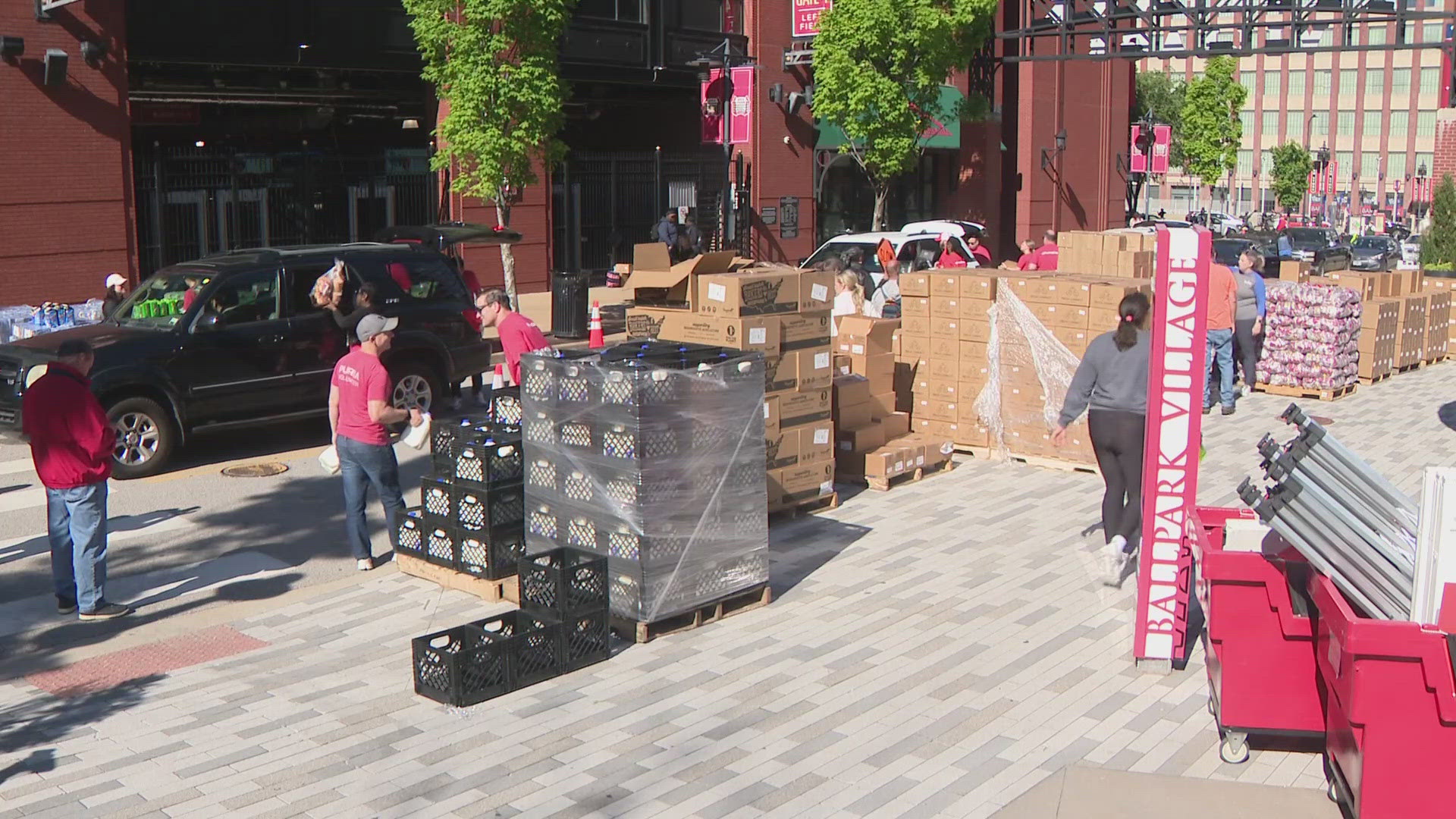 Purina employees spent their morning handing out food and caring for animals.