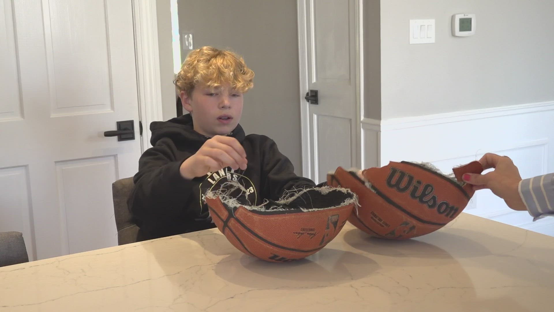 The basketball exploded with Melissa Kraemer's son, Max, standing right over it.