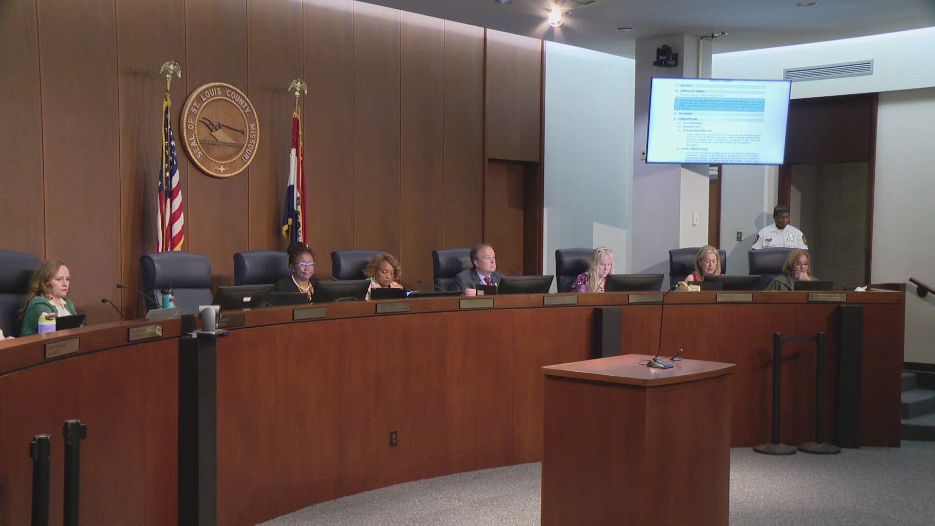 St. Louis County Executive Sam Page was seen working at SSM Health Saint Louis University Hospital, leading to questions from county council members.