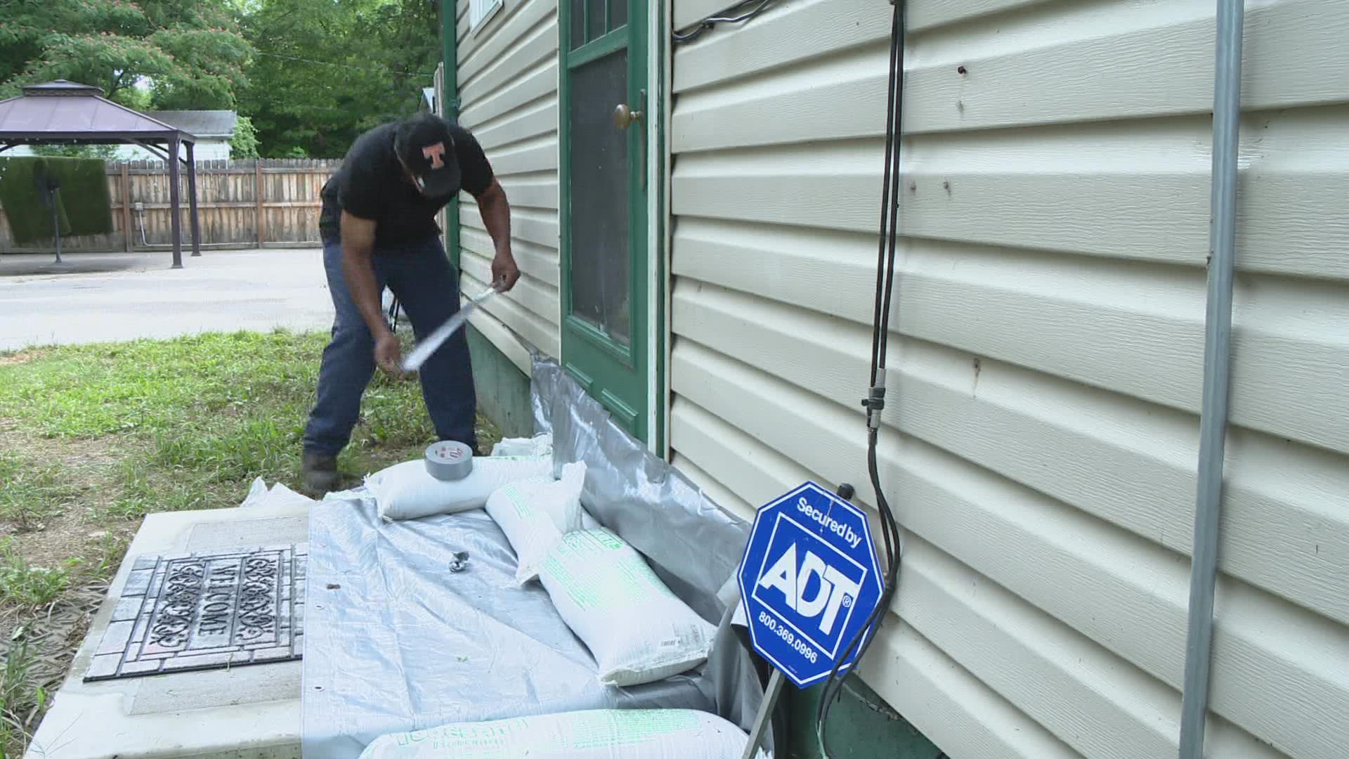 Rain fell again Wednesday on the hard-hit community as they were getting help from the flooding. They were hopeful to keep the water out of their homes this time.