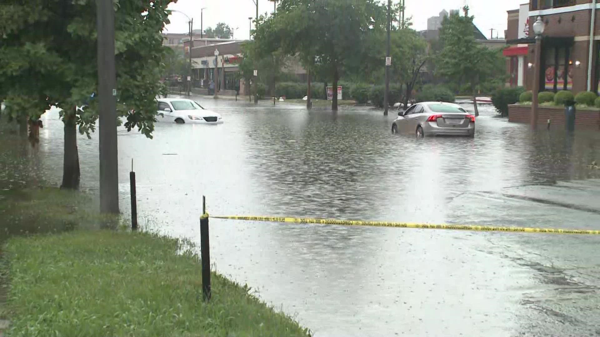 Cars were stuck in floodwaters near Olive and Vandevanter.