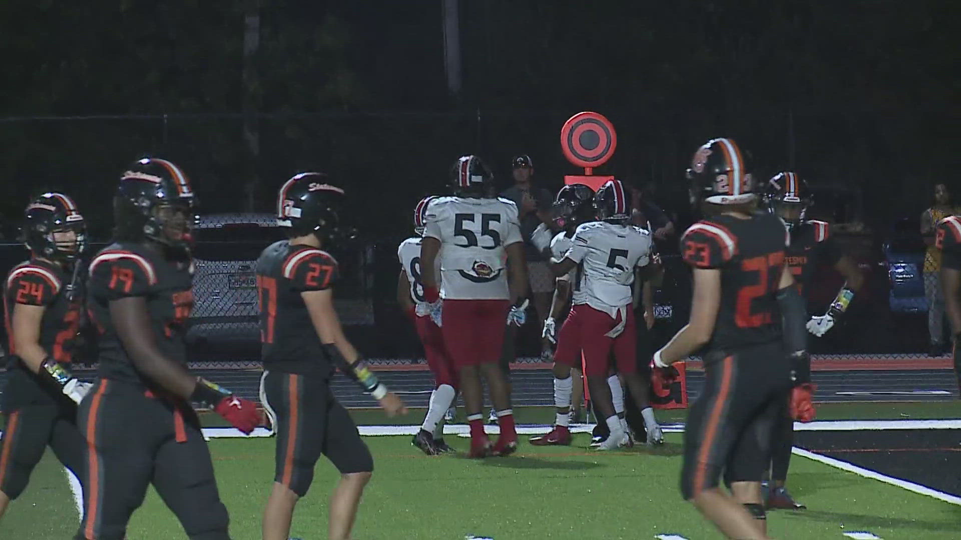 Webster Groves High School opens the new football field with a win over Hazelwood West. WGHS wins 15-13.