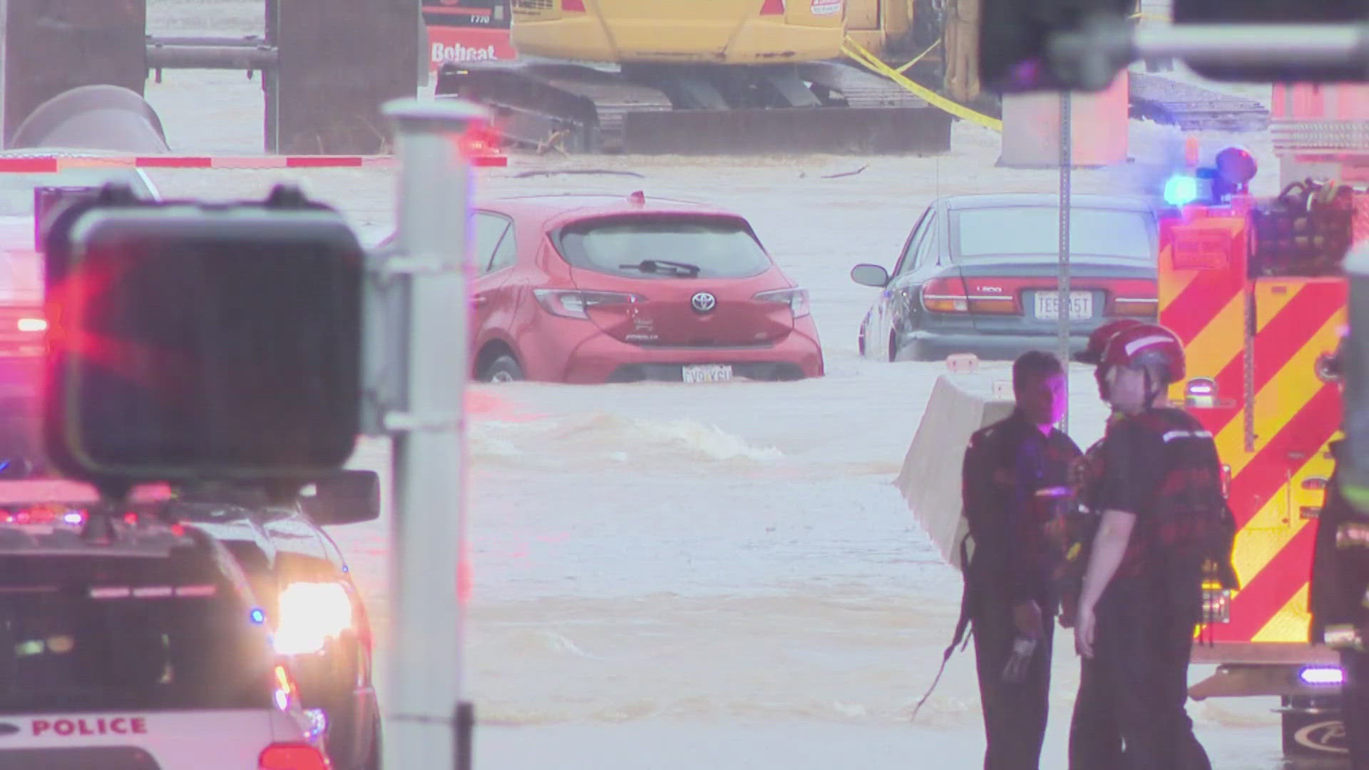 Cars swept away by floodwaters were the main cause of the deaths, first responders said.