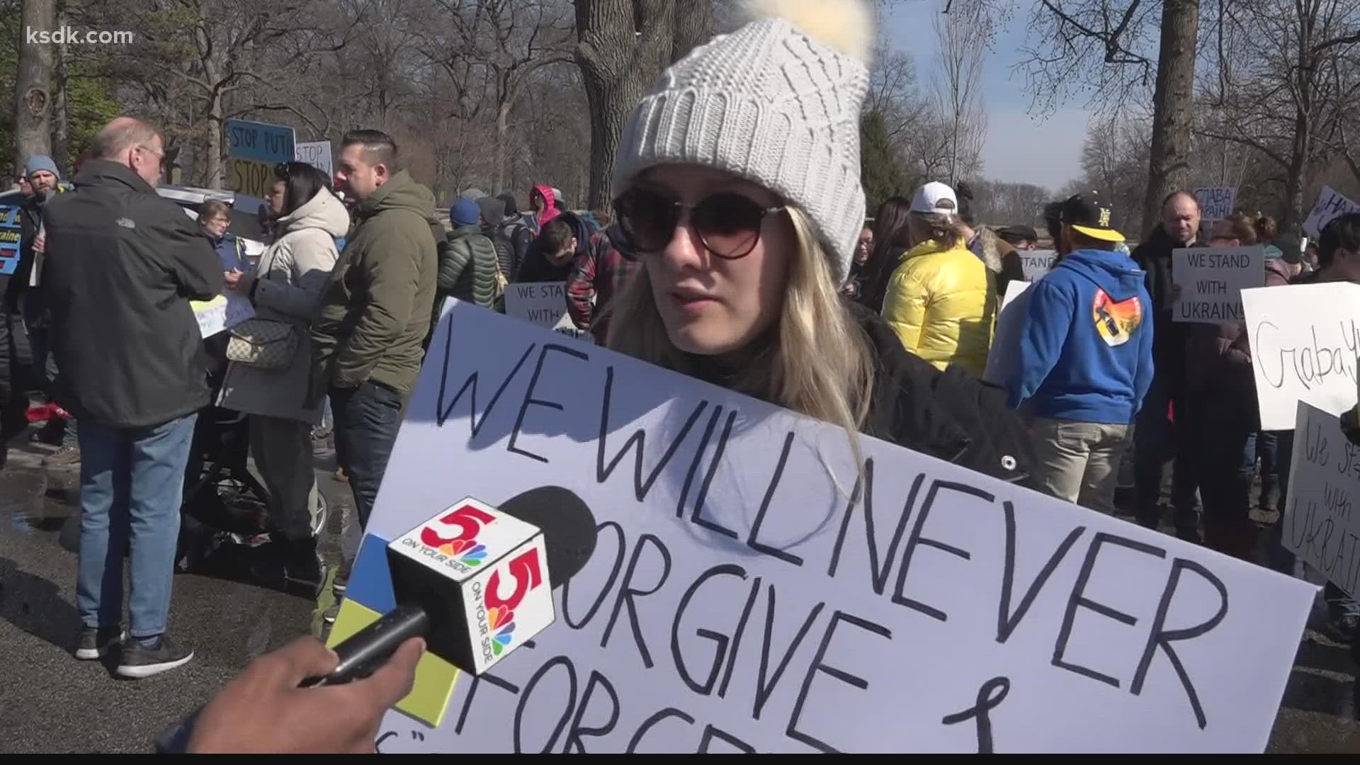 Attendees prayed and sang while drivers honked horns to show support as they passed by.