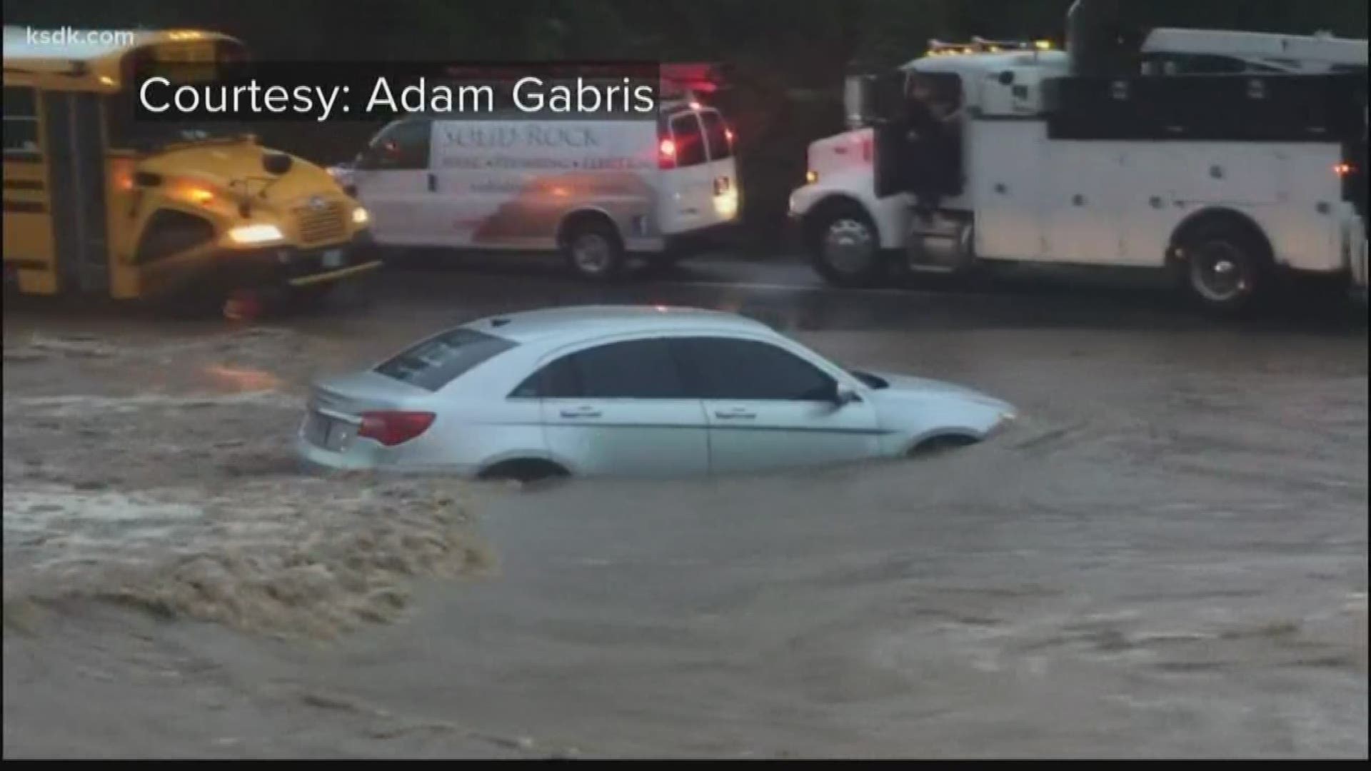 Along Highway 109, drivers watched as a car was swept away by flash flooding along the roadway.