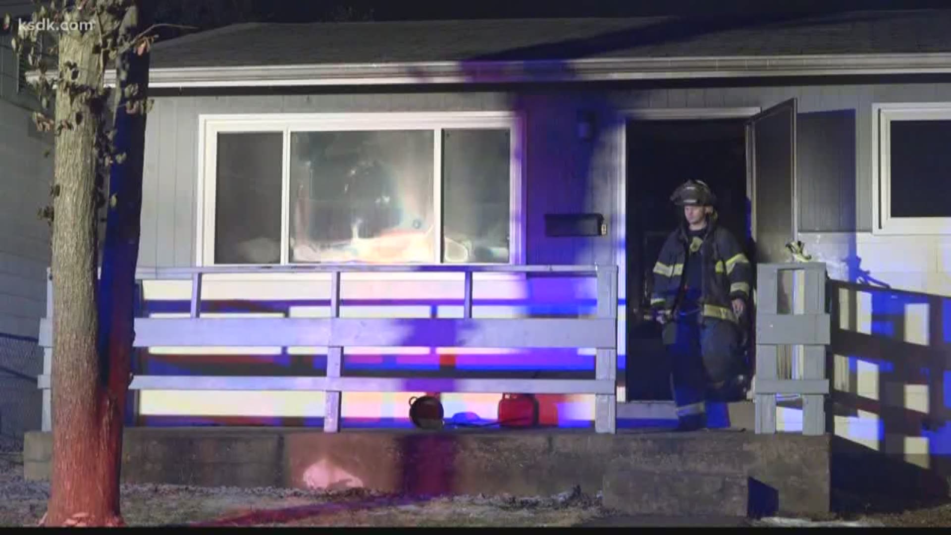 A Ferguson Fire Department captain said the woman was taken to the hospital with burns to her hands and face.
