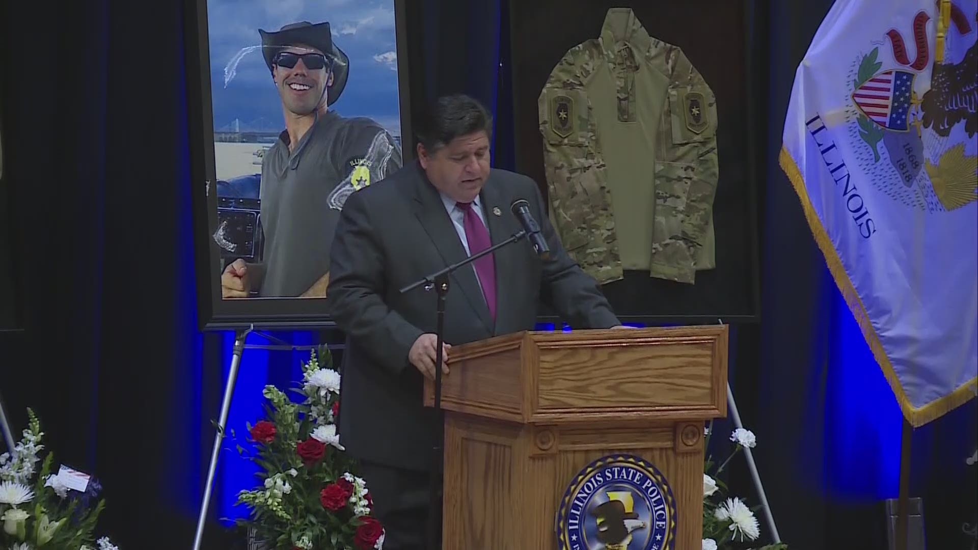 Gov. J.B. Pritzker called Hopkins a hometown hero, adding the people of Illinois "weep for you today."