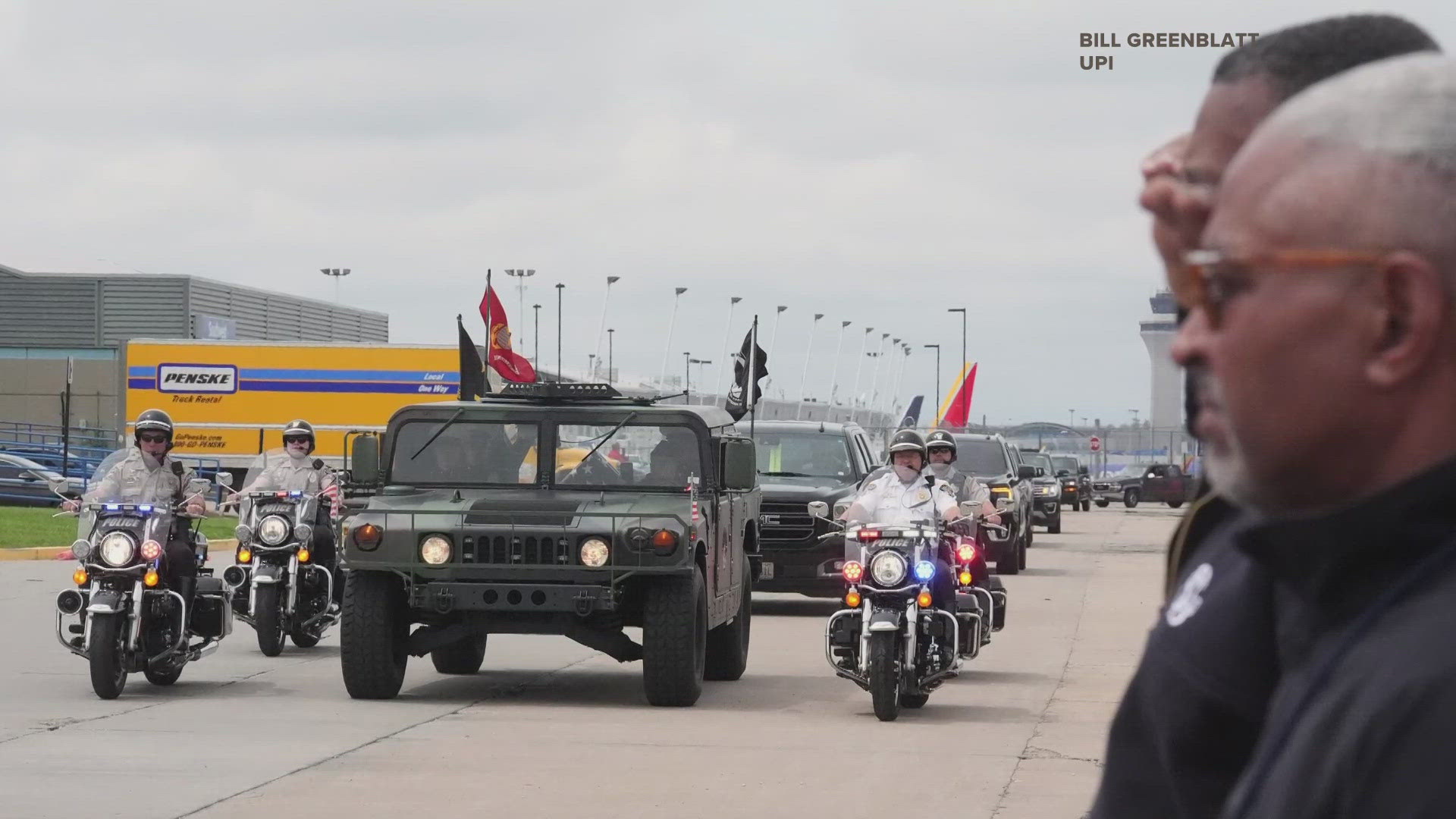 The procession for a fallen St. Charles County Marine closed portions of Interstate 70 in St. Louis County on Friday.