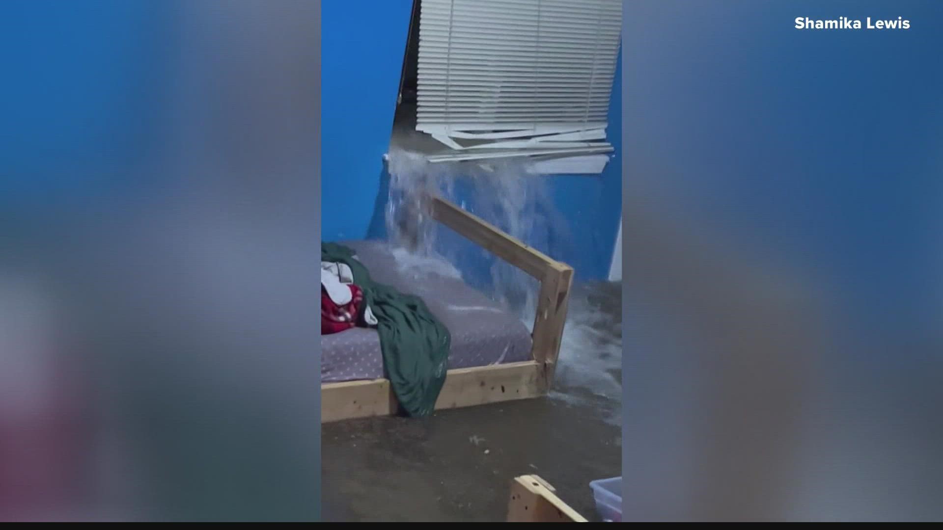 Flood waters broke a window and flooded the Lewis' kids' bedroom downstairs. The shocking video made rounds online.