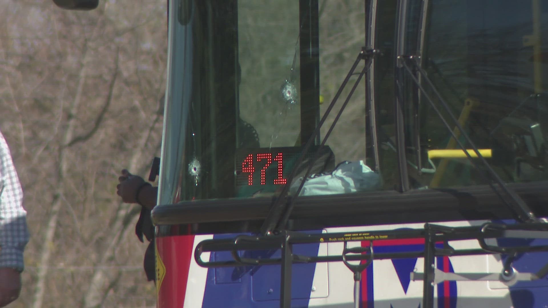 Witnesses said the shooter fired into the bus, then boarded it and fired more shots. Two men were fatally struck.