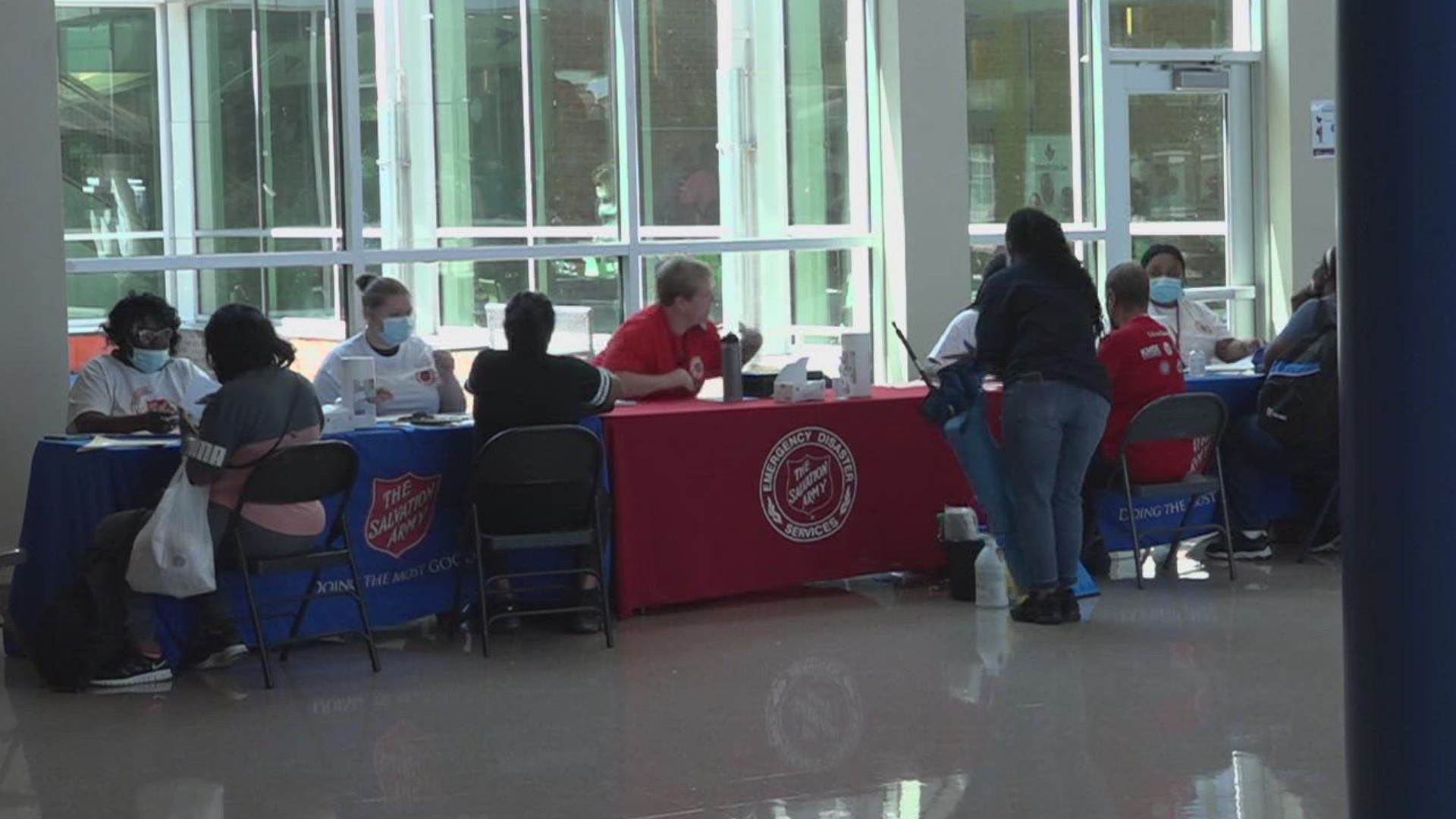 Hundreds of people showed up to a flood assistance resource center Saturday in East St. Louis. Like several resource centers this week, they reached capacity early.