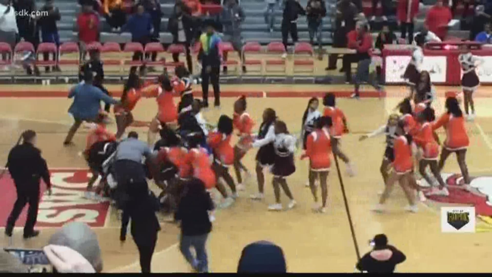 The East St. Louis cheerleading team is benched for their role in this fight. Jenna Barnes talked to the man who recorded the video. He's defending the girls.
