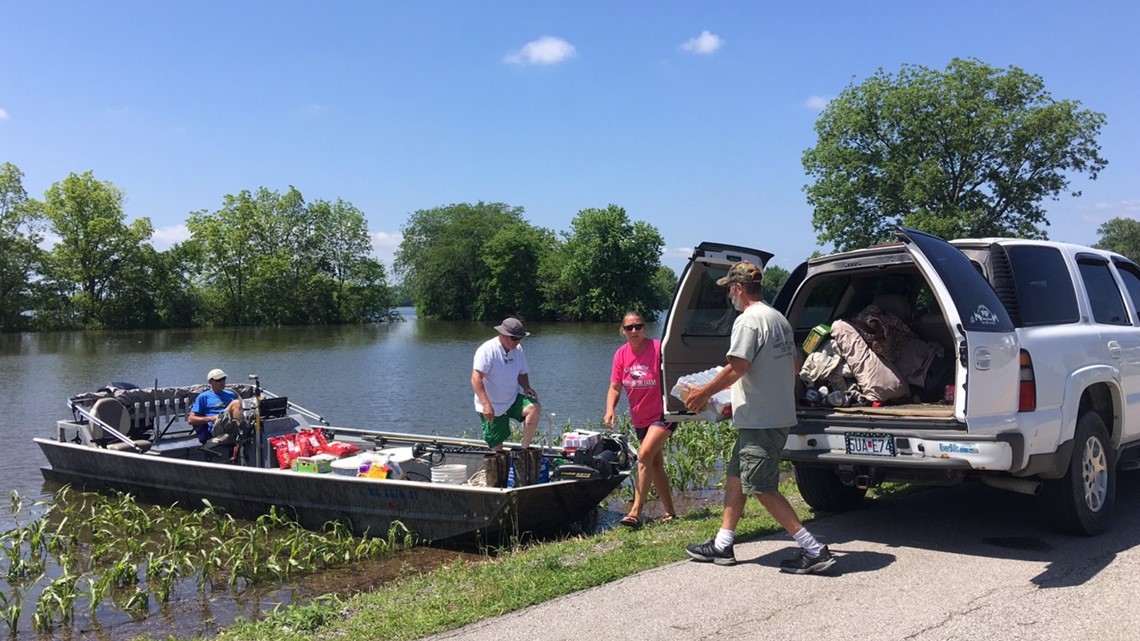 Supplies being brought to Portage Des Sioux by boat