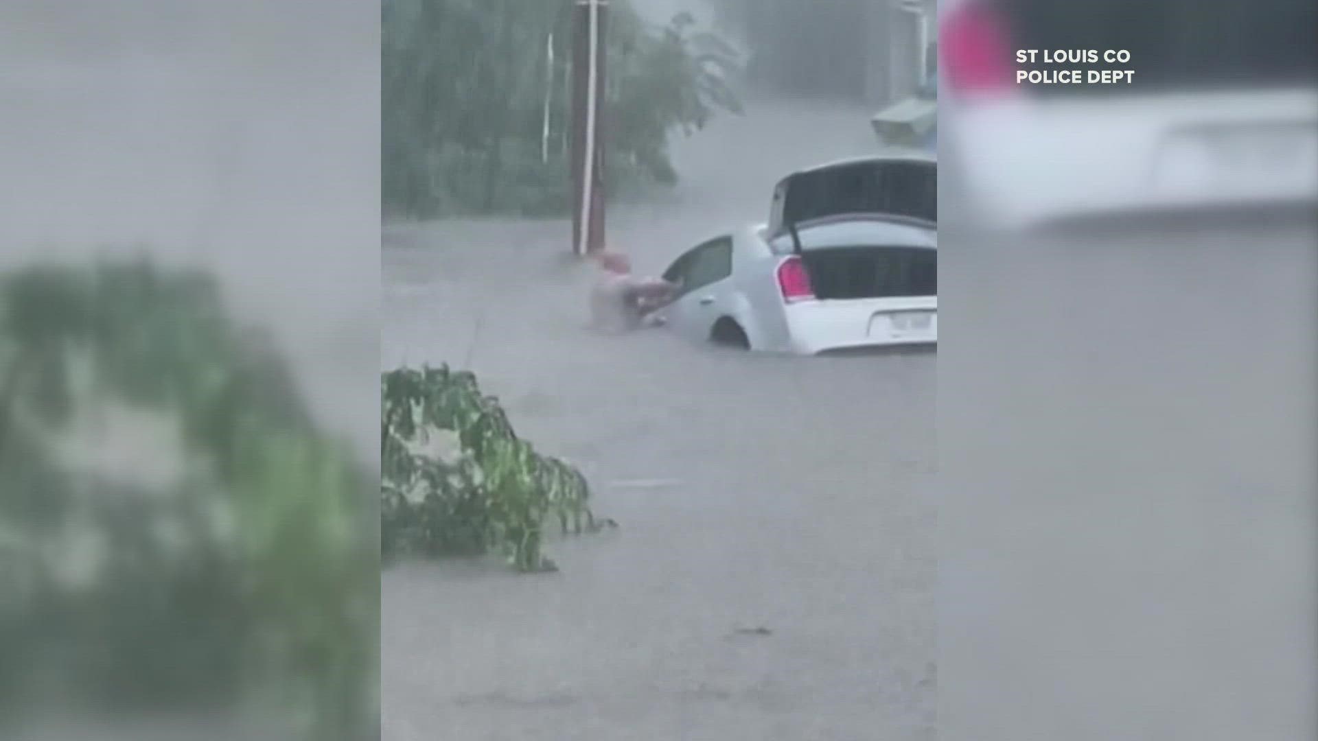 An amazing water rescue by two St. Louis County police officers was caught on camera.