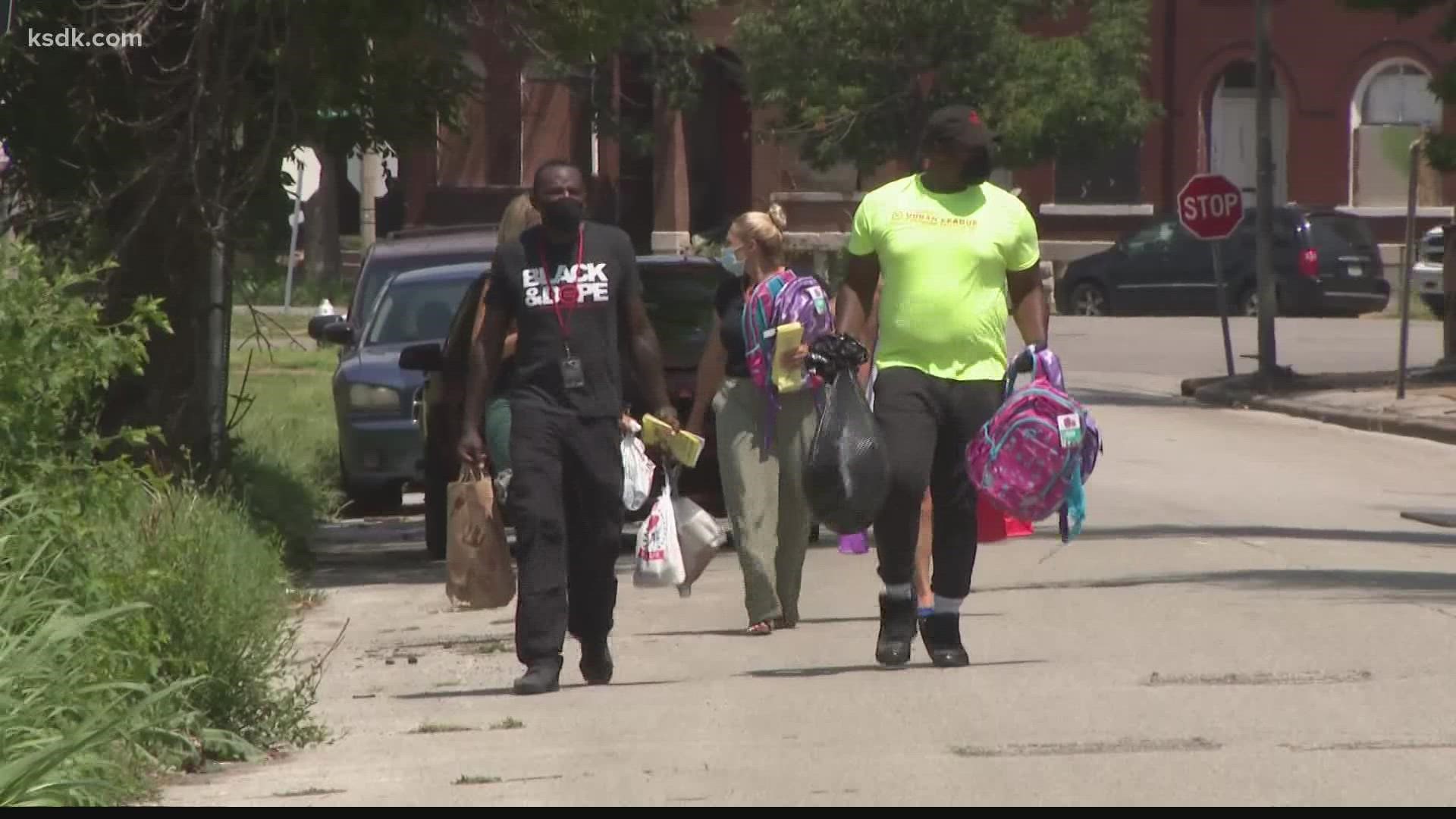 The organization teamed up with The Urban League to go door-to-door to spread love and information.