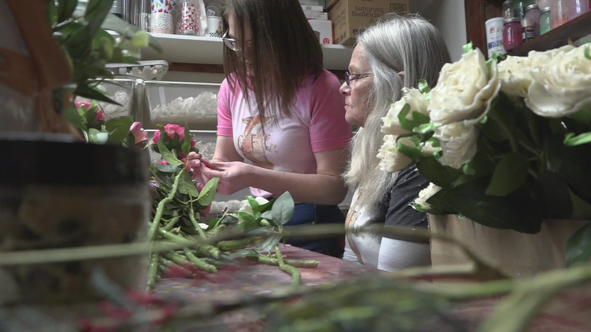 They may look real, but these roses are actually made of wood. Each will be delivered to a senior at a local living facility.