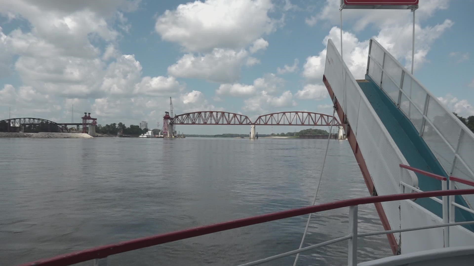 On Thursday, crews worked to lift the final truss of the Merchants Bridge into place over the Mississippi River. The project is expected to be completed this fall.