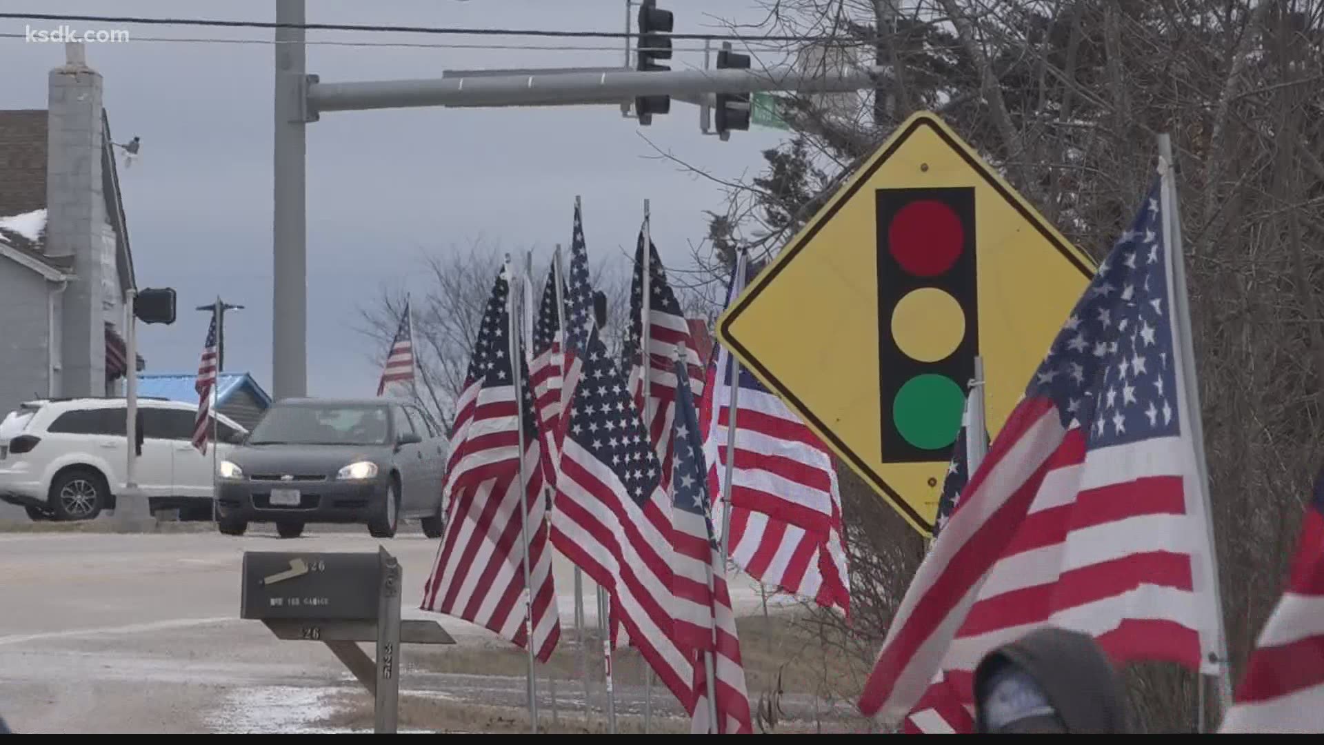 The 1,500 flags were put in place by veterans service organization members and community volunteers