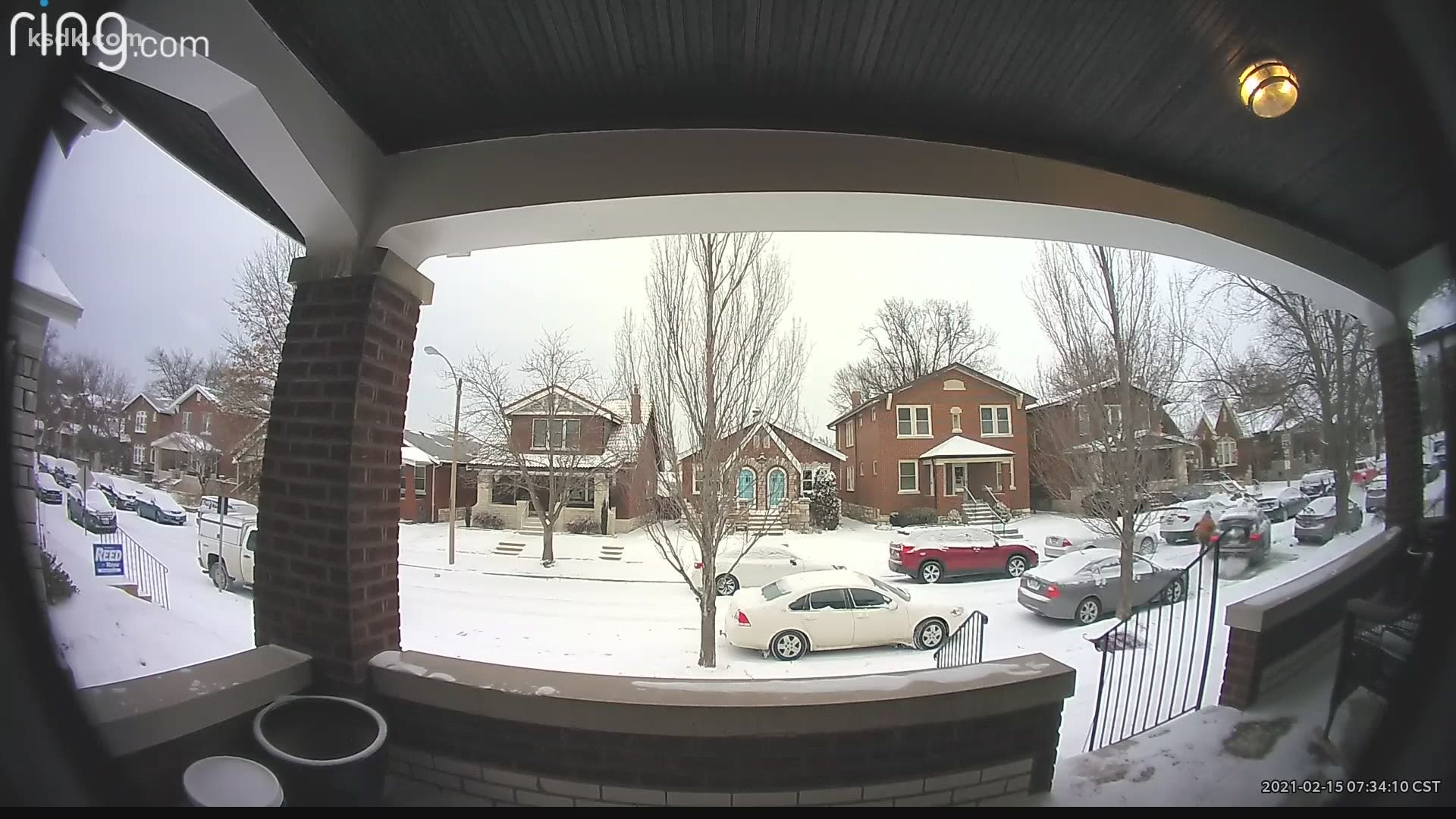 Surveillance video shows three thieves stealing a car left running to warm-up in single digit temperatures