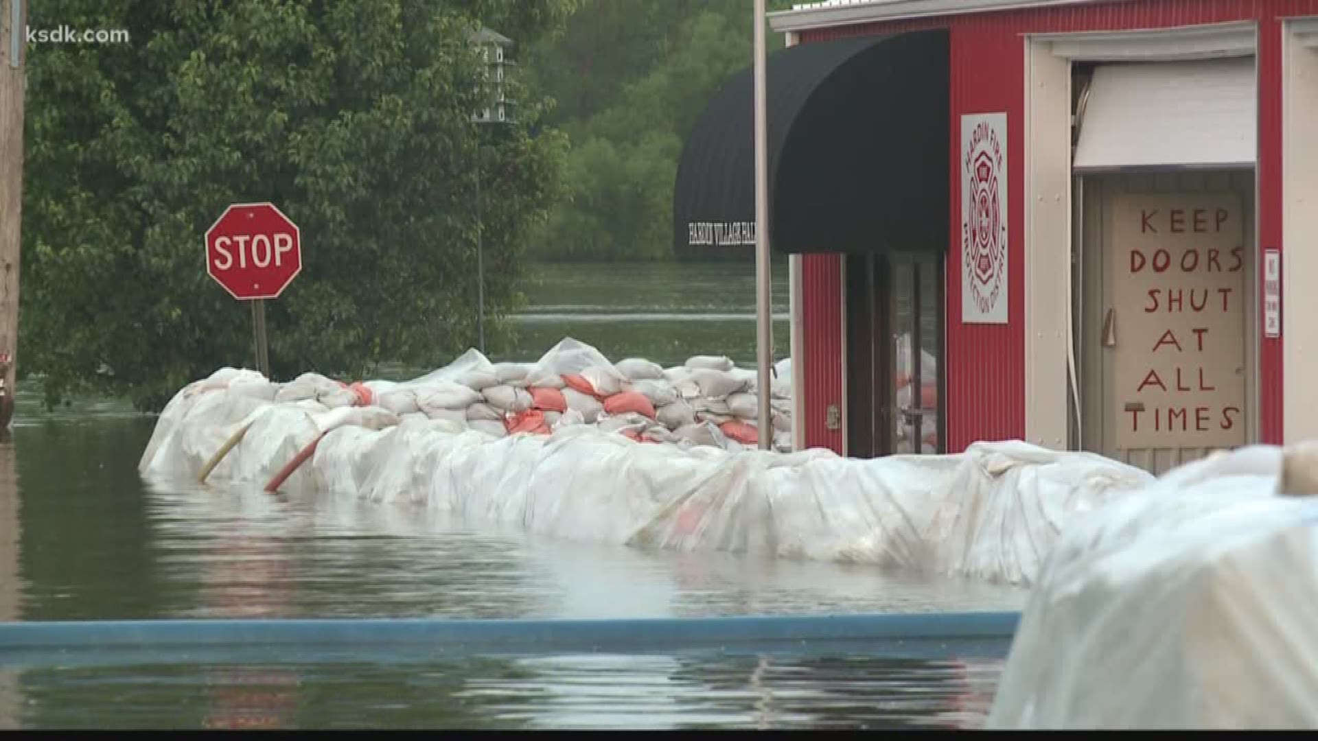 With water closing off the main route out of Hardin, IL, just a trip to the grocery store takes hours.