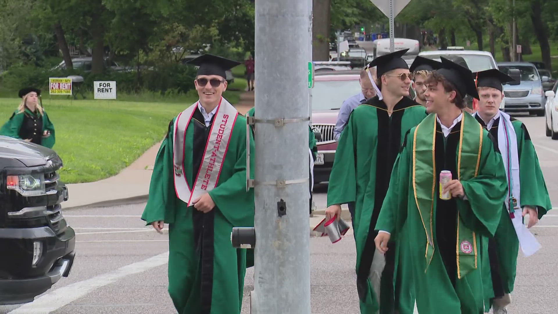 Outside of Washington University's Francis Olympic Field Monday morning, graduates walked towards commencement and passed pro-Palestinian protestors.