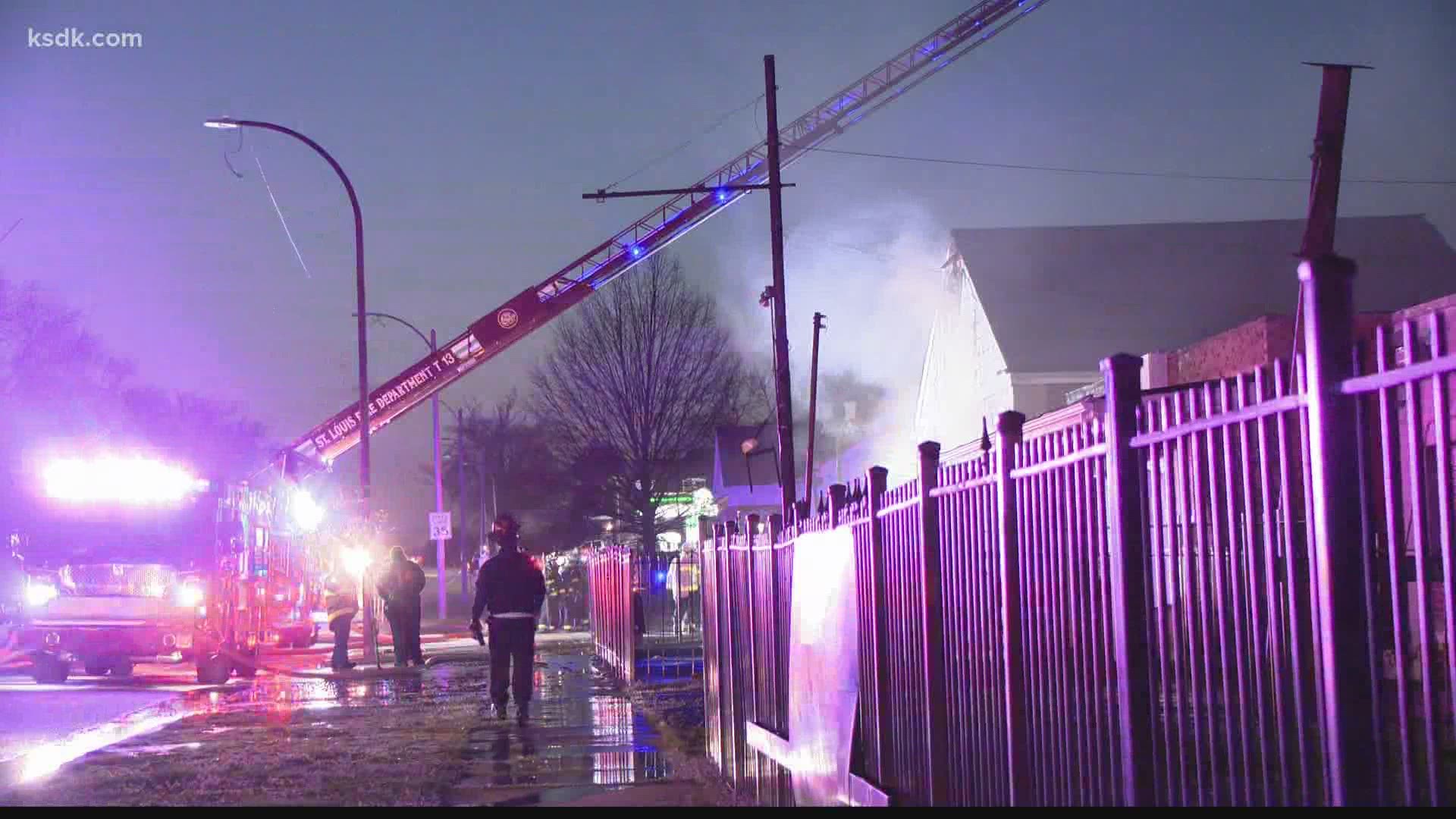 A fire department spokesman said the fire started in a garage in the alley behind New St. Douglas Fellowship Baptist Church at 5945 West Florissant