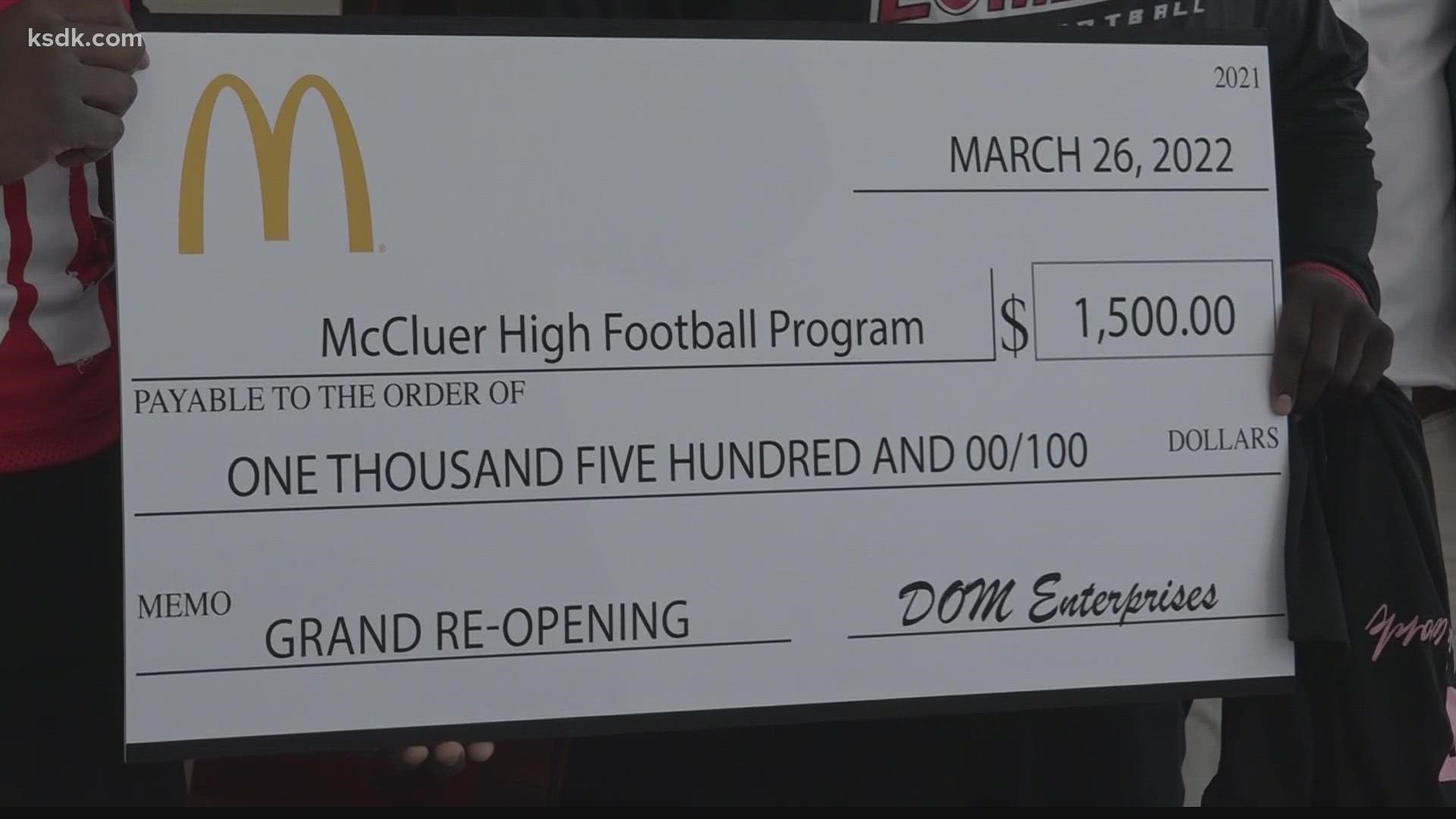McDonald's donated $2,000 to McCluer High School Football team and Pom Squad at the opening.