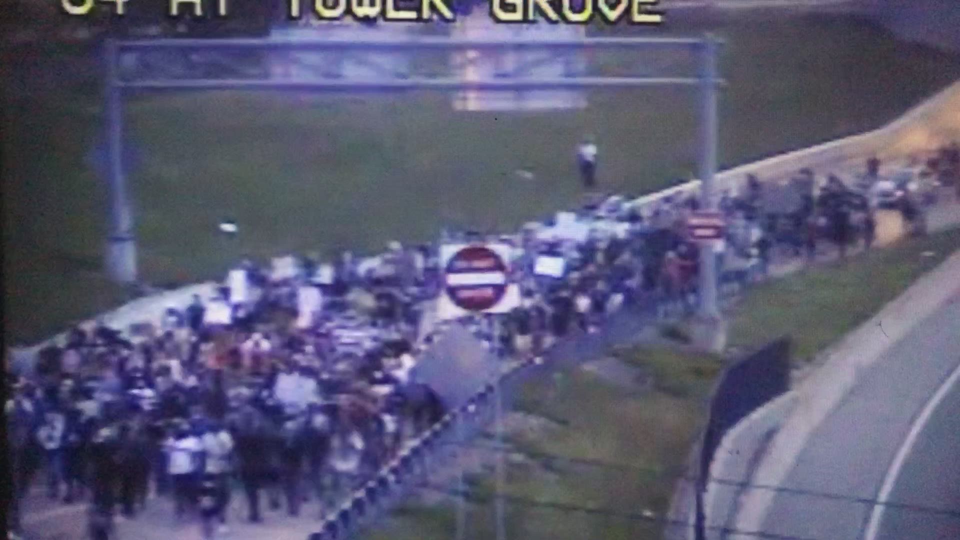Protesters can be seen marching on I-64 from a traffic camera