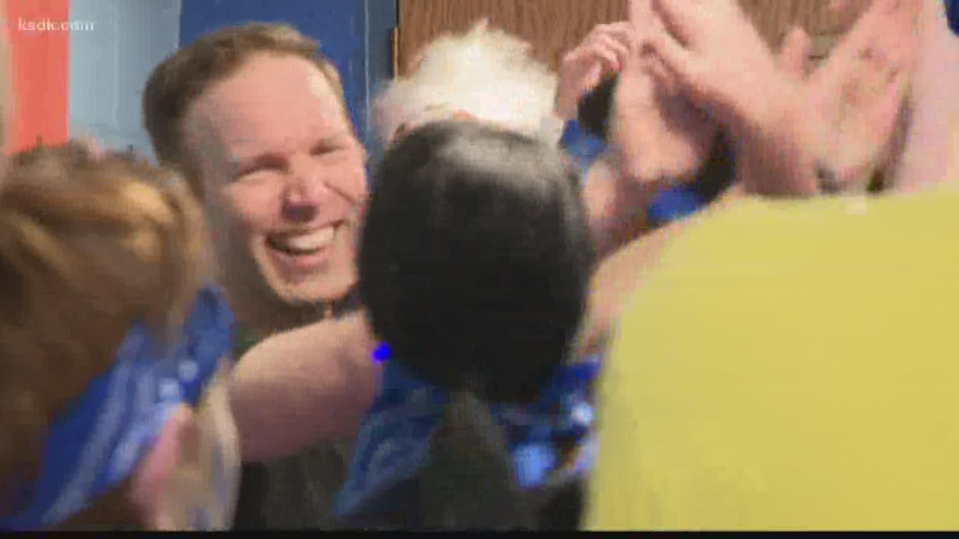 Right when he walked into the gym, several students ran up to him and tackled him with hugs.