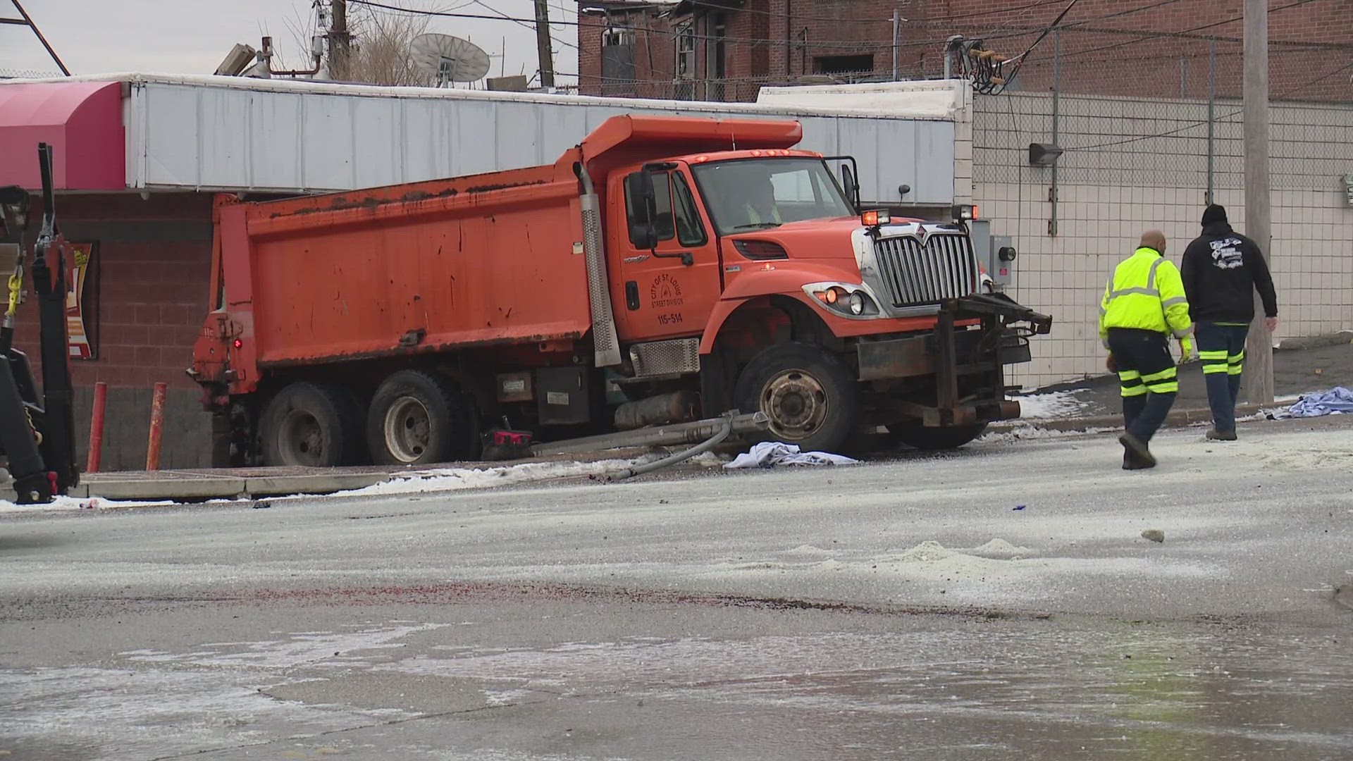 Salt truck loses control, crashes into north St. Louis city supermarket