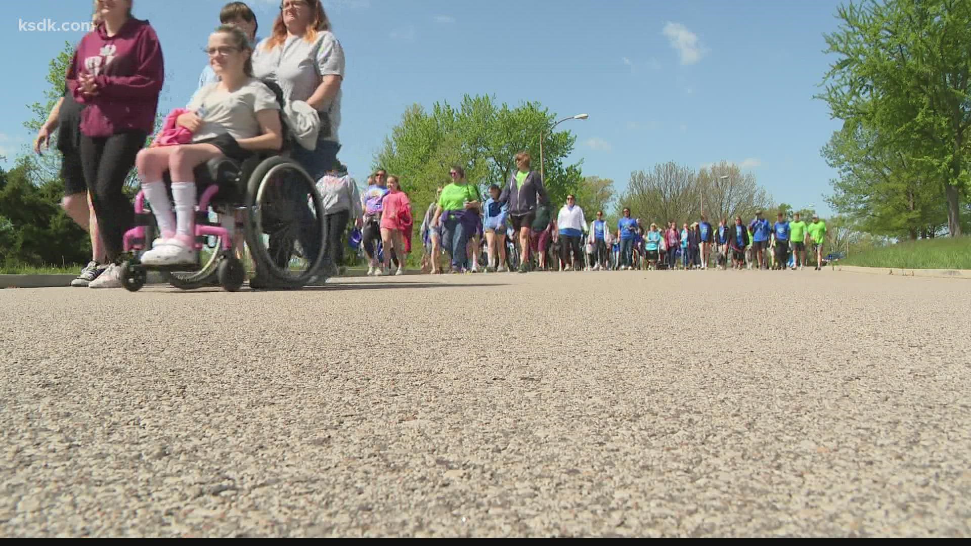Sunday's walk brought together people with muscular dystrophy and their advocates, a chance for some to reconnect and share stories.