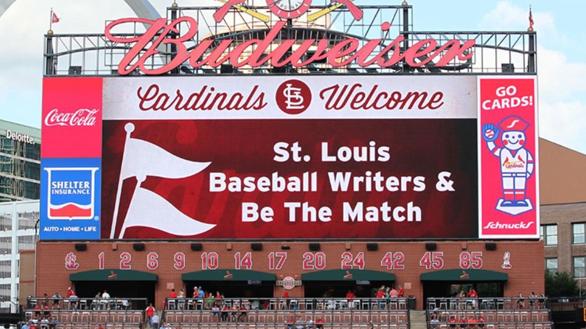 Fans welcome home Cardinals, remember Musial