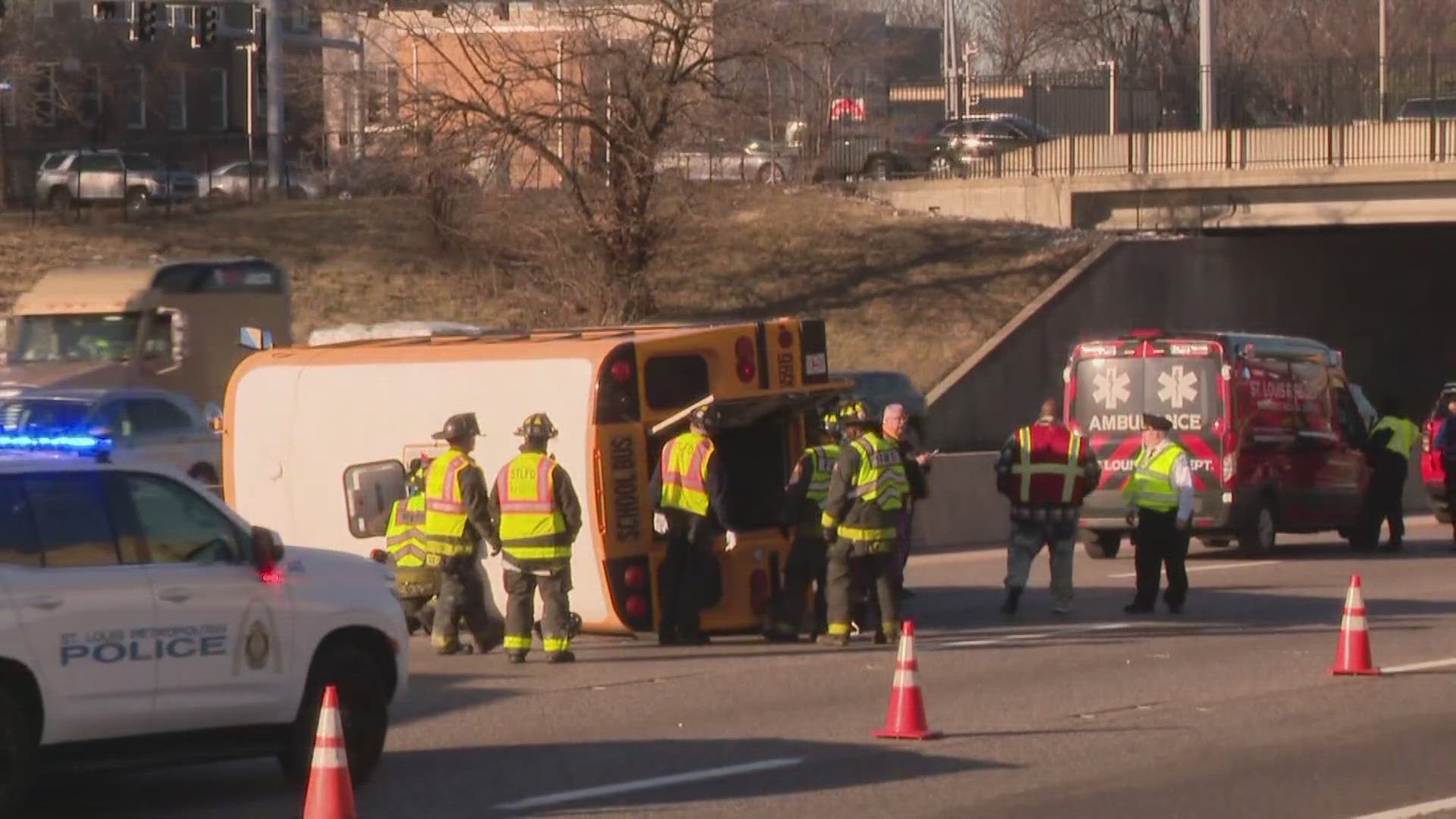 A woman is in custody after a hit-and-run involving a school bus on Interstate 44 Wednesday morning, the St. Louis Metropolitan Police Department said.