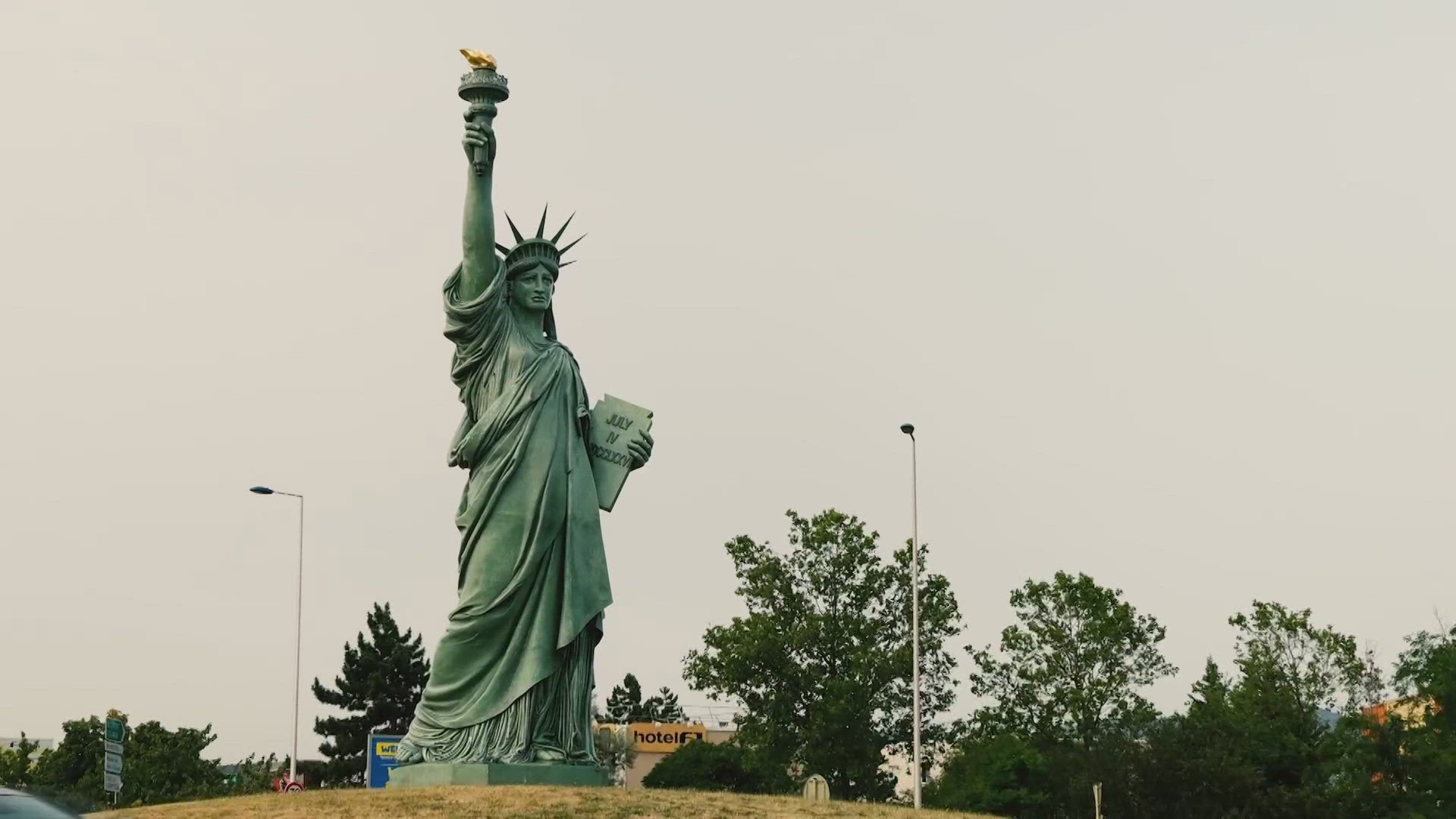 The Summer Olympics in France are now just 16 days away. And one of America's most famous torchbearers was created by a Frenchman.