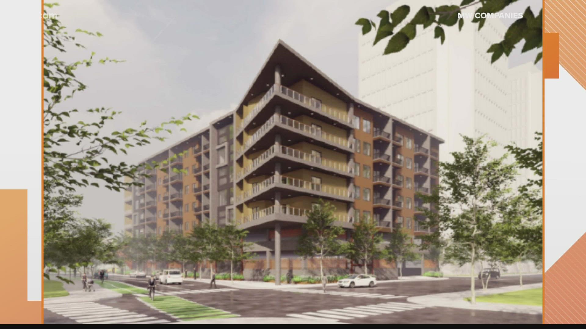 The proposed development would have at least 125 units on top of a three-story parking garage with a pool and rooftop deck