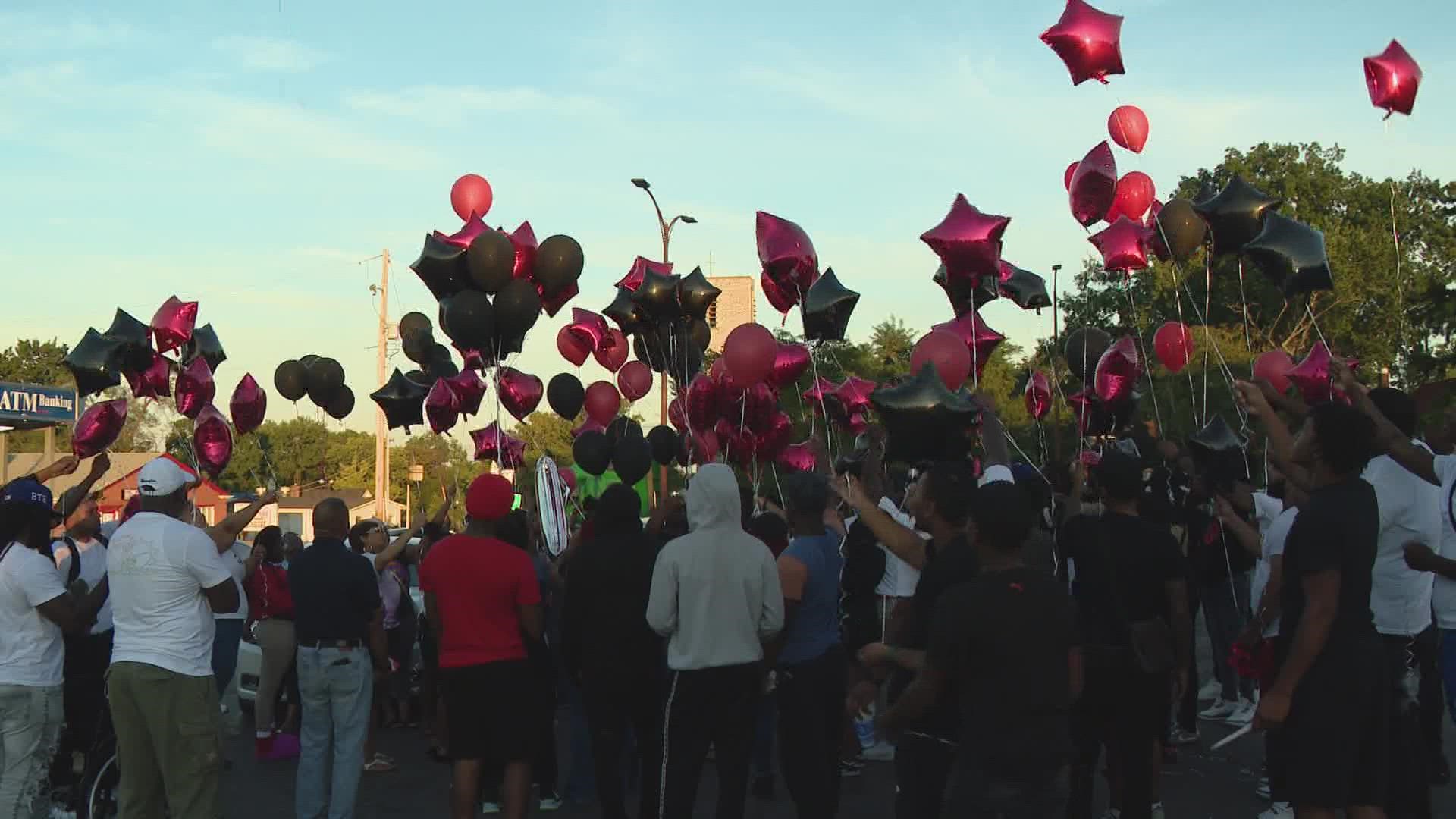 Loved ones pay tribute to Kardayé Moore who was shot and killed inside Beverly Hills Supermarket on Wednesday. They released balloons at the supermarket.