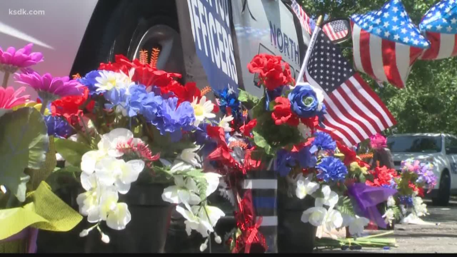The memorial for Officer Michale Langsdorf has been growing by the minute.