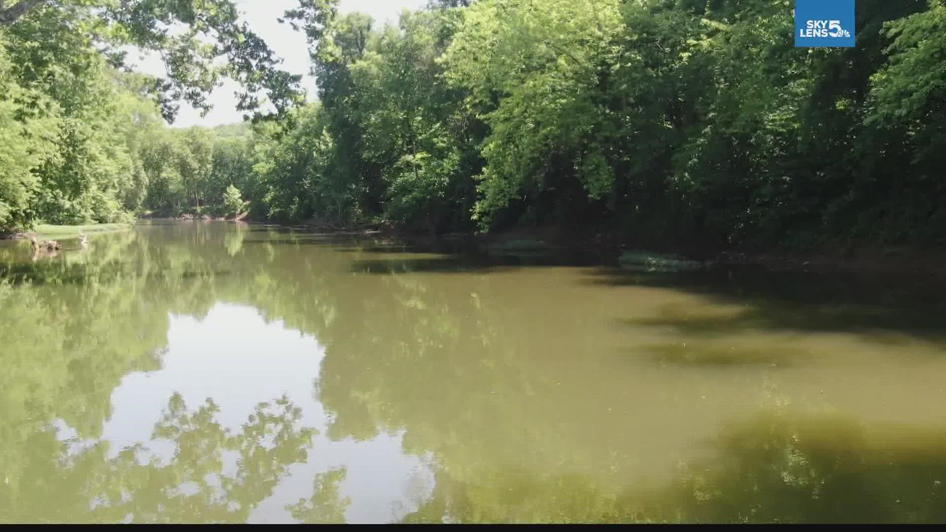 Police said a man pulled the girl from the river and two women performed CPR to get her breathing again.